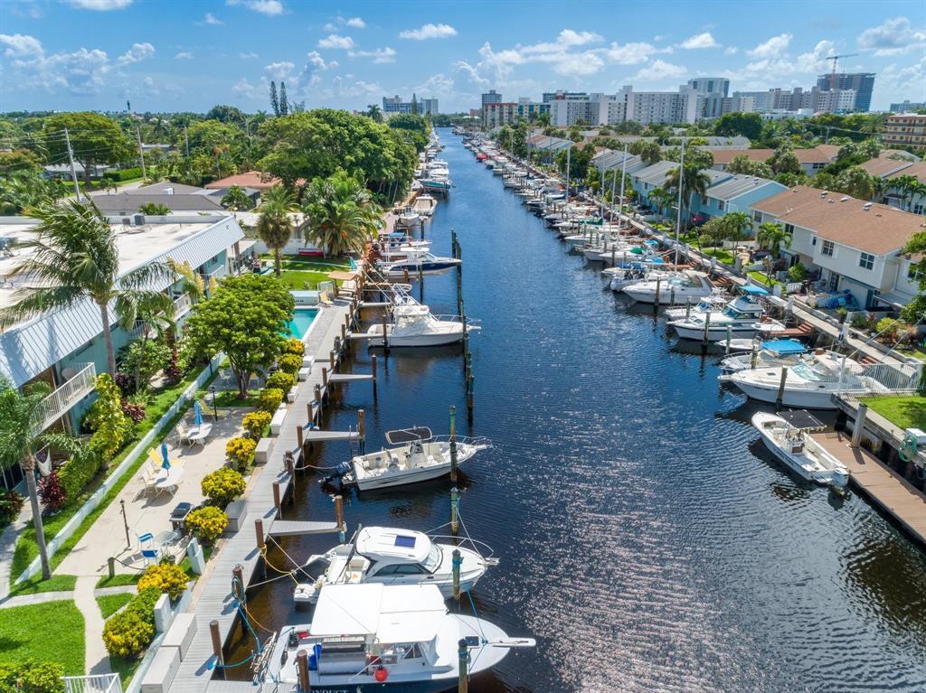 IDEAL LOCATION FOR BOATERS!! BOAT DOCKAGE AVAILABLE UP TO 32' @ $150.00 PER MONTH PAID QUARTERLY (NO WAITING LIST). THIS 2 BEDROOM 2 BATH RESIDENCE HAS 850 SQ FT/79 m2, FEATURING PLANTATION SHUTTERS ON ALL WINDOWS, CUSTOM INTERIOR DOORS, IMPACT WINDOWS, WINE COOLER, MURPHY BED WITH WORK AREA IN GUEST ROOM,  4 FANS, CROWN MOLDING THROUGHOUT. A/C REPLACED 2 YEARS AGO, NEW RANGE/OVEN. THIS BOUTIQUE WATERFONT BUILDING HAS SEVERAL BBQ AREAS FOR ENTERTAINING AND FUN. SHORT DISTANCE TO OCEAN OUTLET. AUTO WASH AREA AND ASSIGNED PARKING. VILLA RIO IS CONVENIENTLY LOCATED NEAR RESTAURANTS AND SHOPPING. THIS RESIDENCE PRESENTS AN EXCELLENT OPPORTUNITY FOR THOSE SEEKING A COASTAL LIFESTYLE IN POMPANO BEACH.