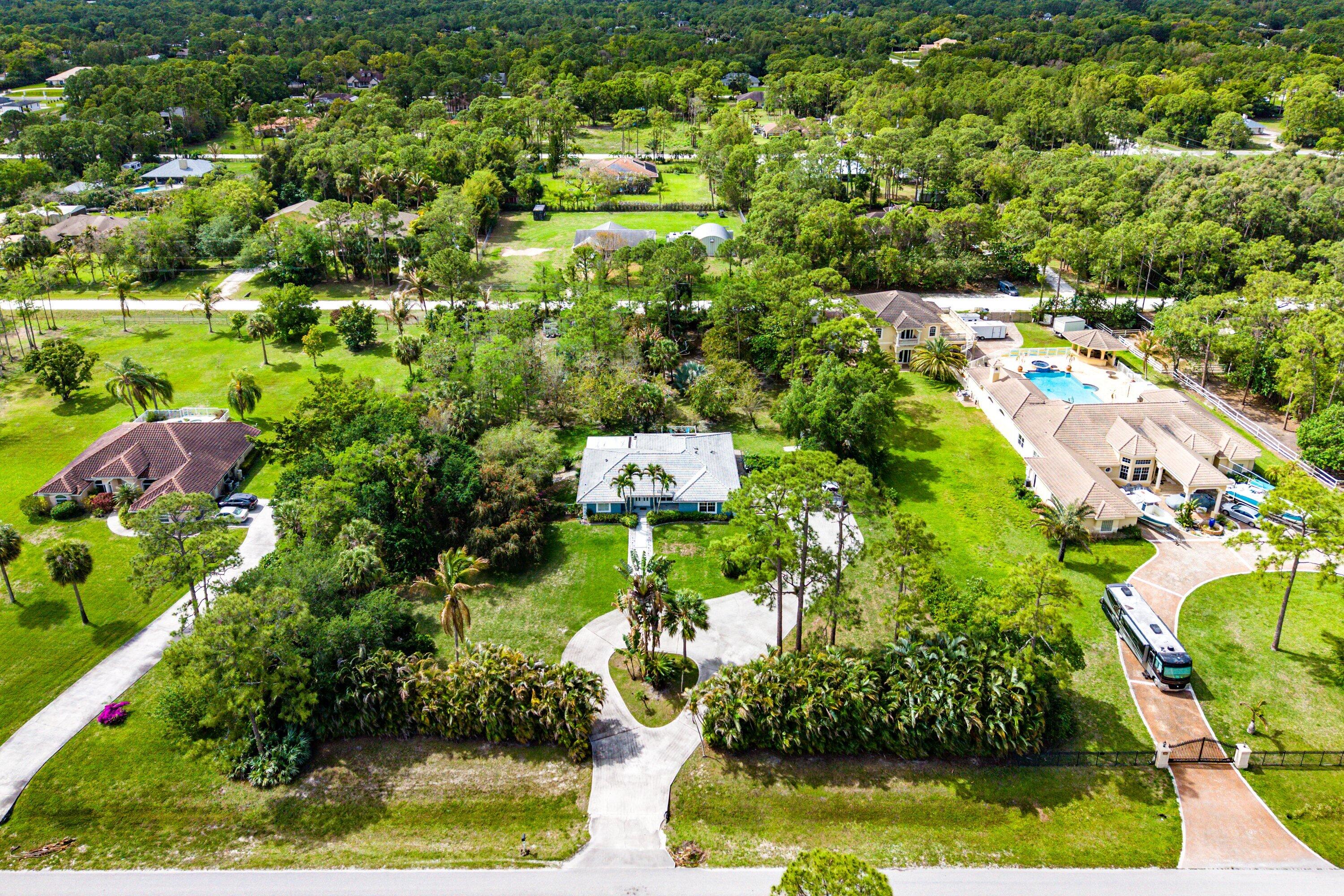 Welcome to this charming 3-bedroom, 2-bathroom home situated on an expansive 1.86-acre pull-through lot in a serene and private setting. Surrounded by beautifully maintained, mature landscaping, this property offers a peaceful retreat with plenty of space to enjoy the outdoors.  Inside, you'll find a well-designed layout with comfortable living areas and a functional floor plan ideal for both everyday living and entertaining. The spacious yard provides endless possibilities, whether you're looking to add a pool, create a garden oasis, or simply enjoy the open space and privacy.  Perfect for those seeking a quiet lifestyle with room to grow, while still being conveniently located near local amenities, shopping, dining, and major roadways. Seller requires 30-day Post Occupancy.