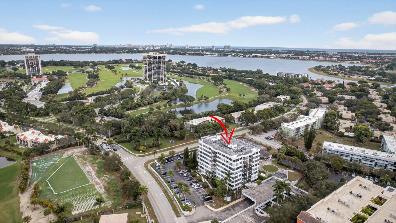 Million-dollar views, exceptional privacy, and unforgettable sunsets define this spacious penthouse 2-bedroom, 2-bath condo offering panoramic scenery and urban convenience. Floor-to-ceiling windows showcase expansive views of the Banyan Cay Resort golf course, filling the bright, open floor plan with natural light and serene vistas. A lush tropical horizon stretches for miles, delivering breathtaking sunsets best enjoyed from the ultra-private balcony—the only one on this top floor. The community features secured entry and two parking spaces. Palm Beach Outlets with shopping, dining, bars, and entertainment are just blocks away. Walking distance to downtown, CityPlace, and Clematis Street, minutes to the beach, with easy access to major highways and the airport.