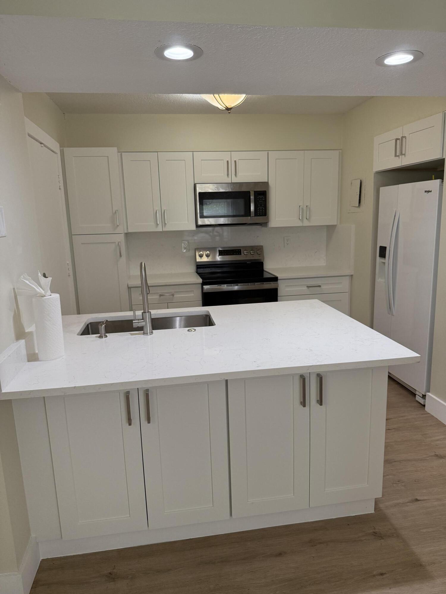 Investor-friendly opportunity in the heart of Coral Springs. Tenant in place paying $2,050/month, offering immediate income and meeting the 1% rule. This updated 2-bedroom, 2-bath first-floor condo features a brand-new kitchen with stainless steel appliances, new water heater, fresh interior paint, an open layout, abundant natural light, and a private balcony with garden views. Pet-friendly community with a pool and on-site laundry. Leasing permitted immediately after purchase with Association approval (12-month minimum lease). Conveniently located just minutes from Costco, Trader Joe's, The Walk, parks, schools, dining, shopping, and major highways.