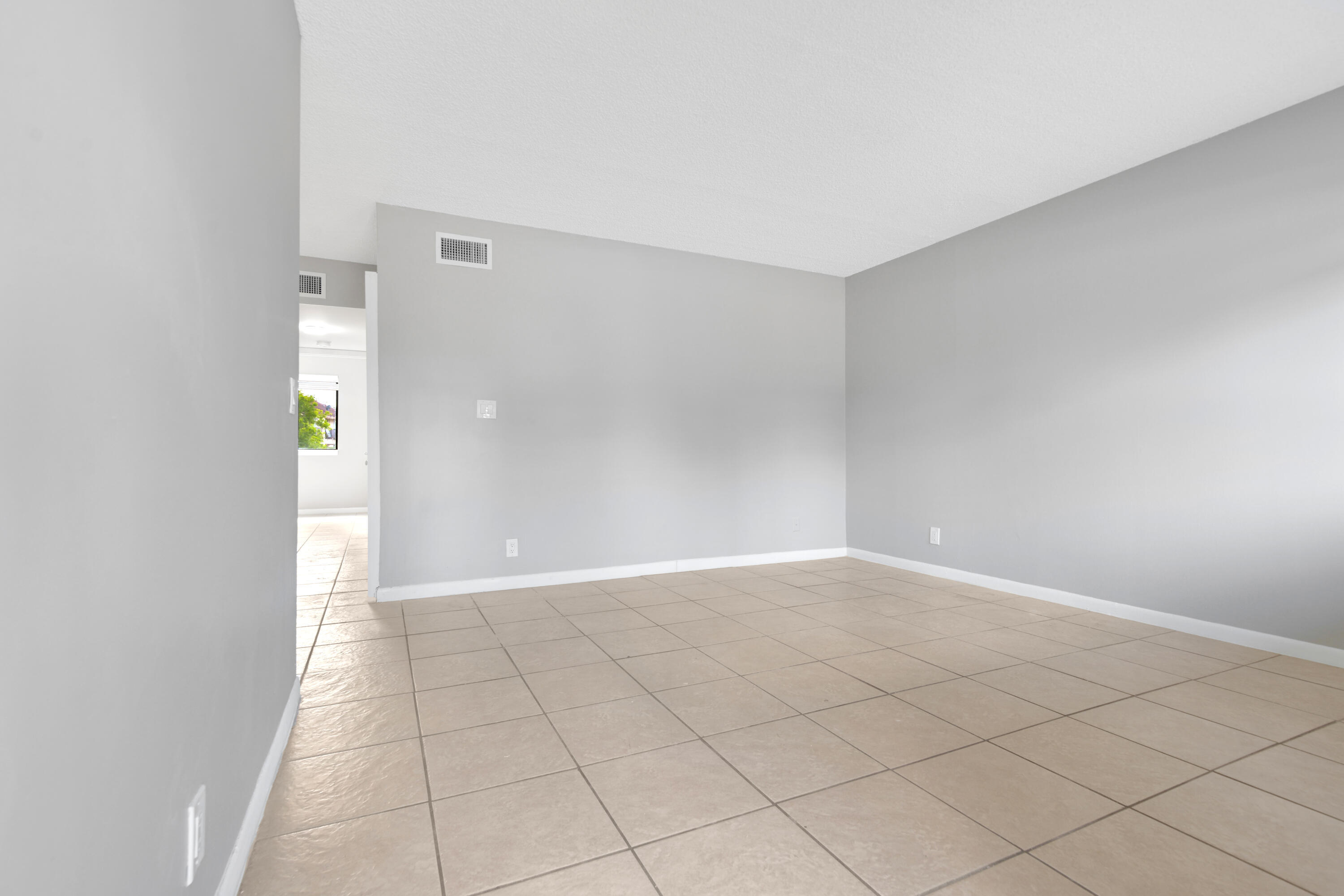 Completely refreshed spacious 2 bedroom unit with 1.5 baths. This 1st floor unit includes new tile throughout, fresh paint, completely re-done bathrooms. Enjoy the screened in room, a private patio and community pool. Association pays for water! Candidates must be screened by the property management company and approved by HOA.   Move in requirements: First, Last, Security deposit. First, Last, Security deposit.   Resident Benefit Package of $64.95 which includes Air Filters, Renters Insurance, Credit reporting of rent and more required in addition to rent.