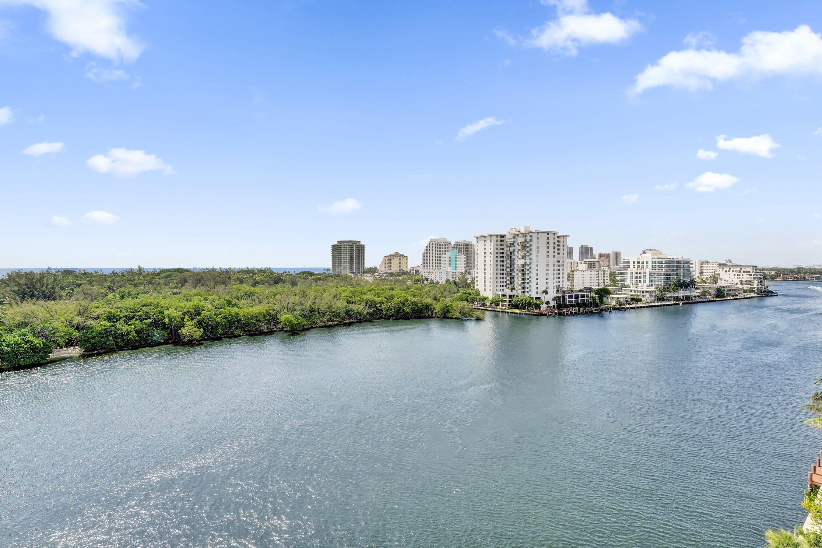 Special luxury opportunity with amazing Intracoastal and Ocean views!  Superior east side location in the Corinthian Condominium.  This is a spacious two bedroom and two-bathroom unit in wonderful condition.  The unit has a great floor plan that flows through the entire building so you can enjoy City views as well.  This unit boasts impact windows, garage parking, 24-hour security.  Roof top pool, sauna, and clubhouse.  This property has it call, location and value.   All concrete restoration work is complete and no pending assessments.