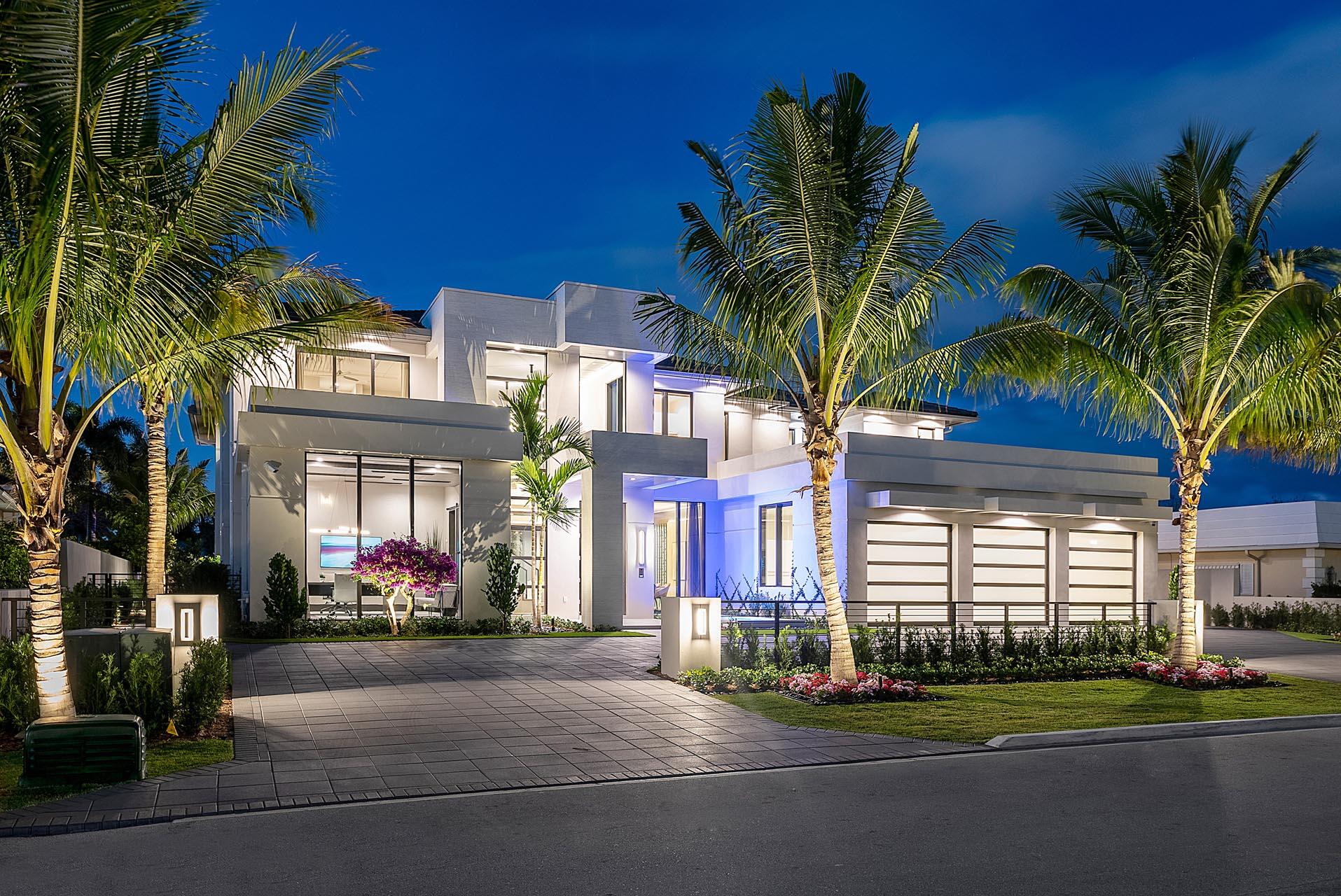 329 Royal Palm Way is a Brand New Golf Course SRD Building Corp. Signature Estate. With 104′ overlooking the Jack Nicklaus Signature Golf Course in Royal Palm Yacht & Country Club, this home has 5 bedrooms, +8,300 sf living space with an open floor plan, towering windows, and trendy interiors. The home includes a formal dining area, club room with stunning bar, dedicated study, multiple living rooms, and a sprawling 1st-floor main suite complete with morning bar, glass shower room, and His & Her boutique closets overlooking the golf course. The dazzling pool is the perfect centerpiece, wrapped by a large patio, covered loggia, summer kitchen, and infinite golf views. Buyer to pay documentary stamp taxes on the deed and title insurance.