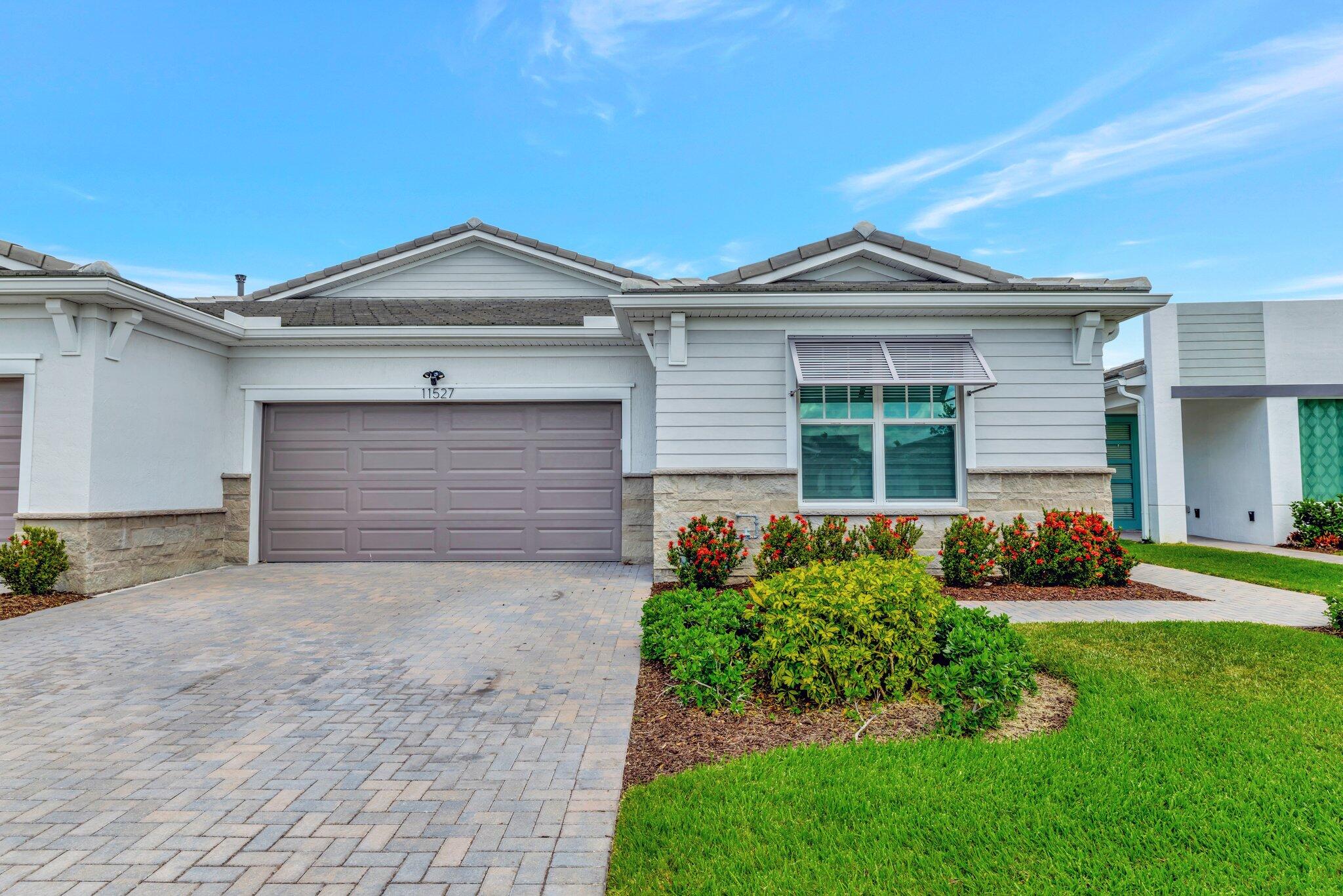 This Eden construction model features 2 nicely sized bedrooms and a beautiful sized office that was originally sold as an opened ''flex'' space without walls and a door. Tiled wood-like floors throughout the entire home. Both bedrooms have an amazing large en suites with the master having a dual sink, both showers are tiled to the ceiling, All modern appliances are included. Enjoy your outdoor time with a screened-in patio & the huge backyard is fenced in. Zebra blinds that open with a gentle pull of the cord and beautiful fixtures with extra larges fans that help keep your A/C costs down. Build w/energy-efficient CBS construction, natural gas & impact windows. Beautiful clubhouse located on a island includes resort style pool, fitness center, bocce, pickleball, tennis courts and more
