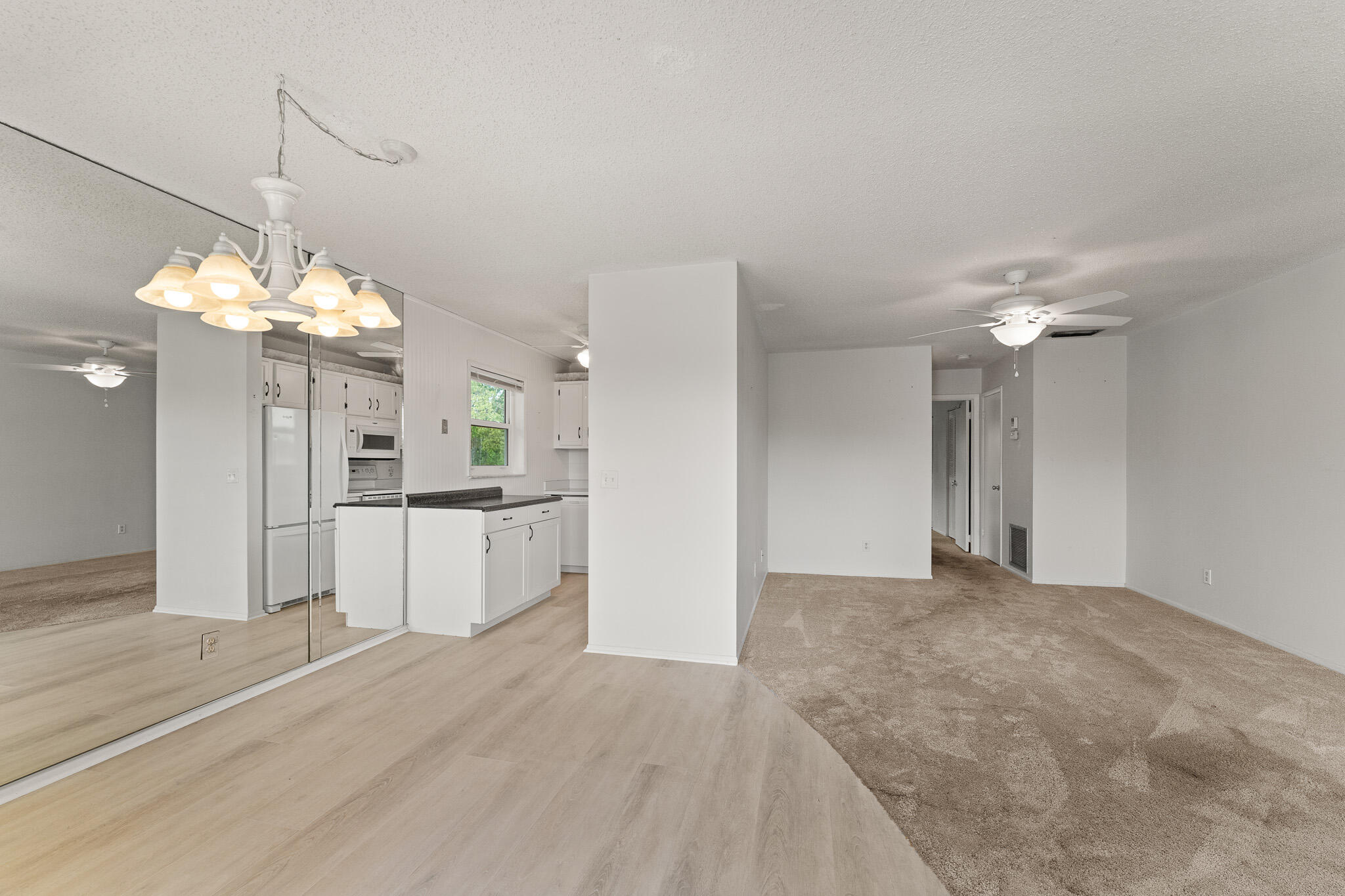 Step into this charming 1 bedroom, 1.5 bath condo on the 2nd floor with lake views in the Vista Del Lago community. Newer A/C system, impact windows, private balcony with windows, providing the option of breeze without any worries. This vibrant 55+ community in the Stuart/Jensen Beach area is adjacent to a public golf course, perfect for you golf lovers out there. Just moments from the Treasure Coast Mall, beaches, popular restaurants, entertainment, and so much more. Assigned parking and private entrances; trucks, motorcycles, and commercial vehicles are not allowed. Schedule your showing online or give us a call directly!