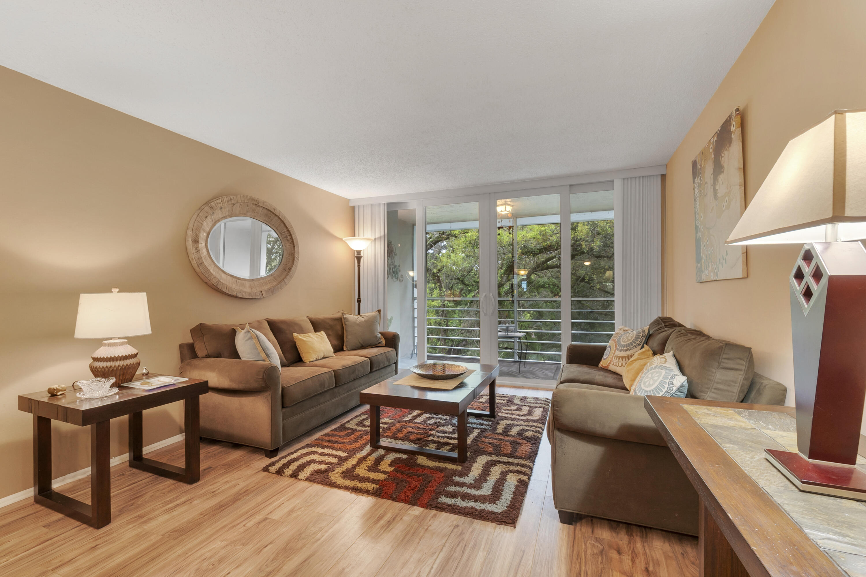 * Investor and Pet Friendly top-floor condo with tranquil views of beautiful live oak tree views in desirable Pine Island Ridge * Feels like being in your own personal "tree house" * This move-in ready unit features a recently remodeled kitchen and bathrooms w/durable high-grade Formica countertops, newer appliances, AC and impact windows/doors. Located in a resort-style country club community with golf, clubhouse, pools, fine dining and fitness amenities. Excellent opportunity for both end users and investors with strong rental demand due to proximity to Nova Southeastern University, Broward College, major highways, shopping and airports * Can be rented 1st year * Two pets up to 25 lbs/each allowed * Can be sold furnished * Club membership included in monthly fee * Pride Home Warranty *