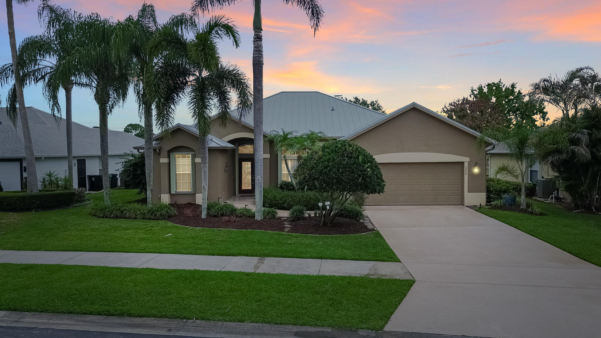 Enjoy stunning lake and pool views from this beautifully maintained 2003 CBS home in the gated community of Crane Pointe at Sawgrass Lakes. This 4BR/2BA split floor plan features soaring ceilings, hardwood cabinetry, Corian countertops, newer appliances, accordion shutters, and a 2-car garage. The spacious primary suite offers a walk-in closet, shiplap accent wall, dual sinks, walk-in shower, and jetted tub. Outdoor living shines with a large screened lanai, solar-heated pool with waterfall features, outdoor shower, and lush landscaping overlooking the lake. Major updates include a 2023 metal roof and 2025 A/C. Low HOA, central location, boating access to interconnected lakes, plus RV/boat storage available through the Master Association for $325/year.