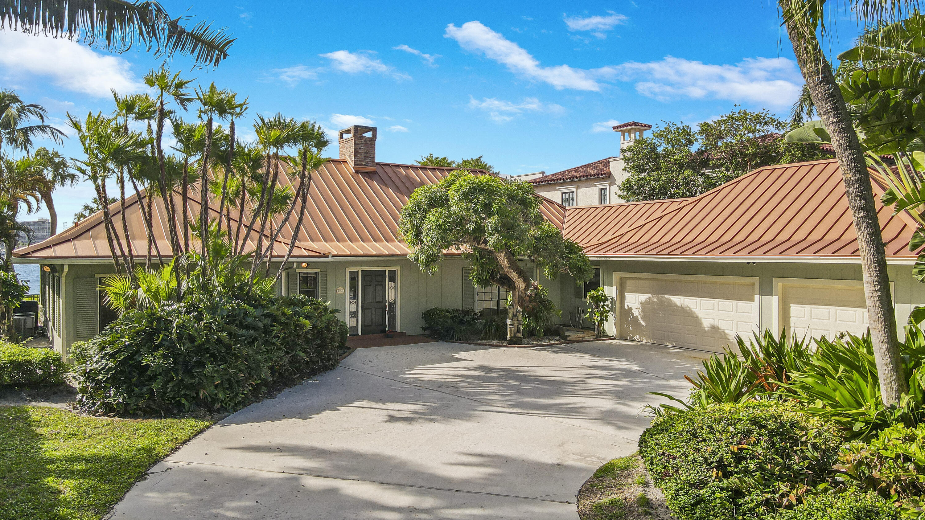 This prestigious North Palm Beach property offers dazzling views across the Lake Worth lagoon. Highly coveted location with southern exposure and nestled in a small gated enclave of luxury homes. Convenient to a host of amenities - yet tucked away in a private cul-de-sac just off of A1A. This 'boater's paradise' can accommodate a large vessel. It boasts direct ocean access with no fixed bridges. Boating enthusiasts will relish the convenience of the straight run down Lake Worth to the Palm Beach Inlet making every voyage a breeze.  The existing 4/3 pool home is spacious, well maintained, and contains 3,647 sq ft. However, the real value here is in the land. This is a rare opportunity to build a custom waterfront masterpiece with commanding vistas. North Palm Beach's thriving luxury real estate market contributes to the long-term potential of this property as an investment. Perfect location close to world class beaches, golf, fishing, dining and more!