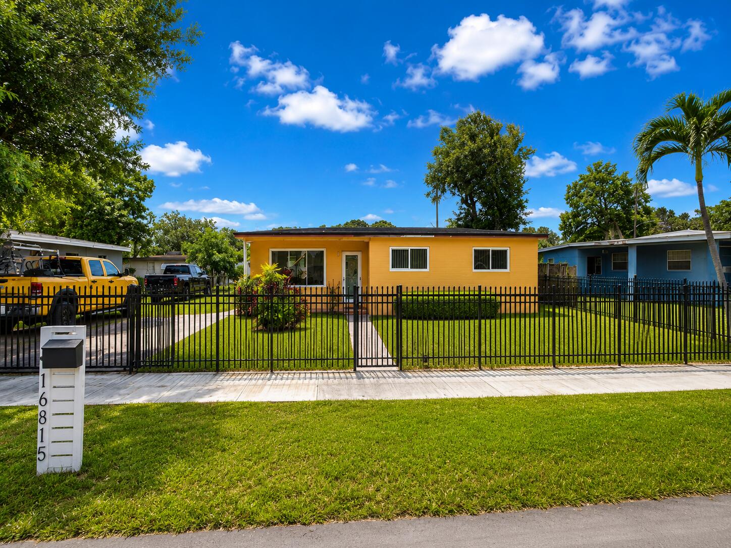 Great Opportunity! Well-maintained 3-bedroom, 1-bath home featuring a newer roof (approx. 2 years old), impact windows throughout, polished terrazzo floors, and a beautifully updated open-concept kitchen with modern cabinetry, stainless steel appliances, and a large island. Situated on an oversized fenced lot with plenty of room for entertaining, pets, a boat, RV, pool, or future expansion. Conveniently located near major highways, shopping, dining, schools, and everyday conveniences. Move-in ready and full of potential!