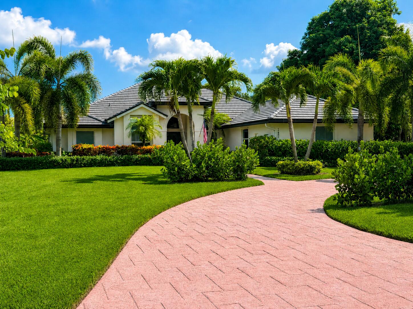 Golf and water views, a sprawling 1-acre homesite, and a desirable single-story layout define this beautifully maintained 4-bedroom, 2.5-bath pool home with 3-car garage in the sought-after community of Bay Hill Estates. Privately situated on a quiet cul-de-sac with coveted southern exposure, this CBS residence offers an open, light-filled floor plan designed for everyday living and entertaining. Architectural details include soaring vaulted and tray ceilings, tile flooring, recessed lighting, a wet bar, and a built-in entertainment center. The kitchen features granite countertops, stainless steel appliances, a tiled backsplash, and abundant white cabinetry. The spacious primary suite offers generous closet space and direct access to the screened pool and covered patio, creating  a seamless indoor-outdoor lifestyle.