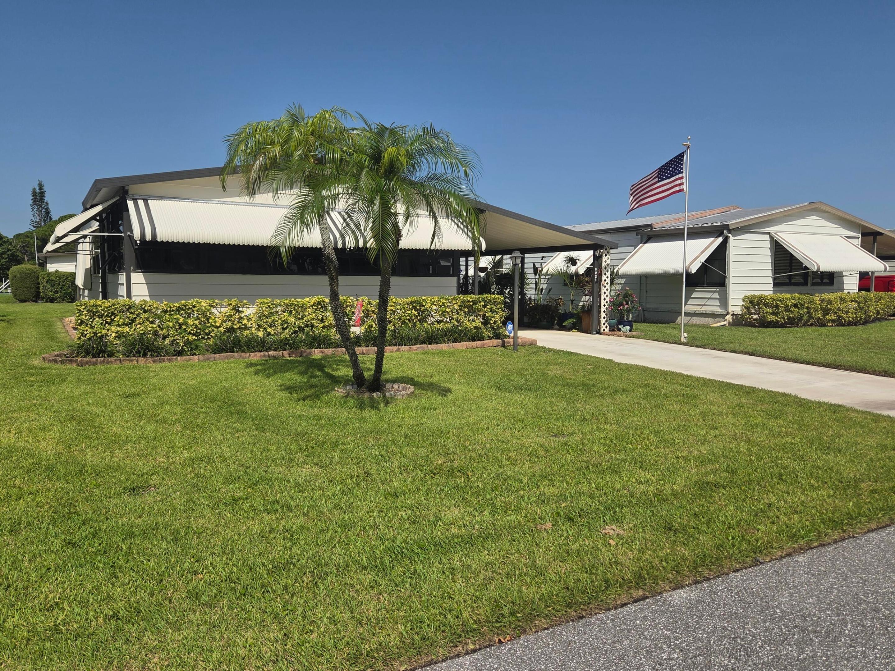 Welcome to this charming, updated manufactured home nestled in an inviting 55+ community. Recently refreshed from top to bottom, you'll stay cool with an air conditioner installed in 2021,and the vapor barrier is updated for in 2026.Inside, you'll find brand-new flooring and subflooring throughout, giving the entire space a fresh, modern feel. Washer and dryer are just two years young.The kitchen is equipped with a refrigerator, microwave, and dishwasher all only a year old, so you can move in and start cooking right away.Both bathrooms have been upgraded with replacement vanities and toilets,adding a touch of modern comfort.From the new skirting, updated lighting, and ceiling fans, to the newly installed living room window and accordion shutter,every detail has been considered. This house is truly move-in ready.