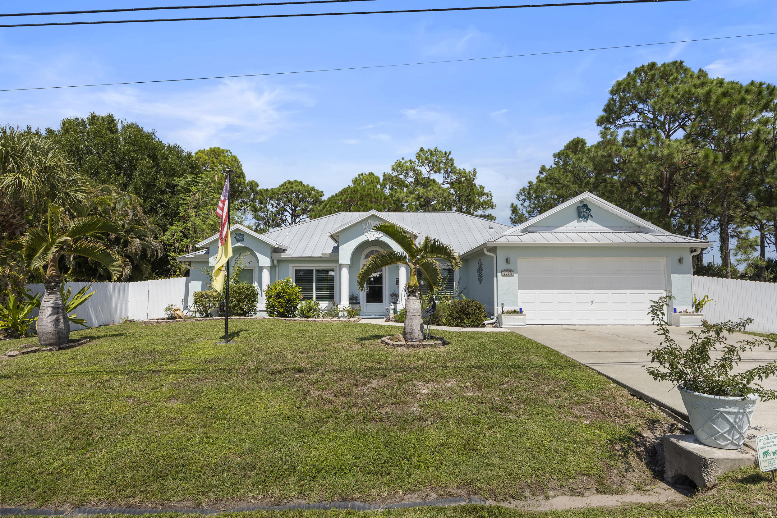 Second chance at this beautiful home! Previous contract was unable to close due to the buyer's home sale contingency. Inspection and appraisal have already been completed. Resort style living meets everyday comfort in this beautifully updated 3 bedroom, 2 bath home. Enjoy a salt water pool with spa plus a separate 6 person Jacuzzi perfect for entertaining or unwinding. The 8ft fence surrounds the backyard for optimal privacy. Inside, wood plank tile floors, plantation shutters, and hurricane impact windows create both style and security. The fully renovated bathrooms shine, and the kitchen features new appliances ready for your next culinary adventure, especially with the free standing range with double ovens!  A 2020 metal roof and thoughtful layout add peace of mind. All this in a fantastic neighborhood close to shopping, dining, and more!