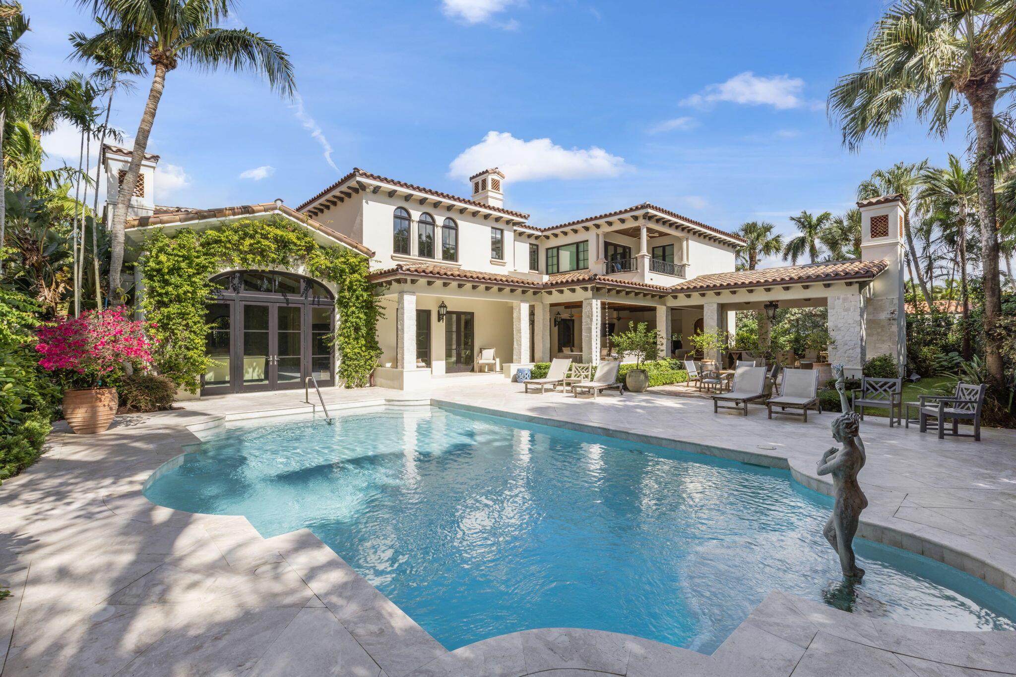 Beautifully reimagined 6 Bedrooms, 6 Full (3 Half) Bath estate situated in the Coveted Phipps Estates. This magnificent home had a renovation that was completed in 2022. The brick motor court leads you into an inviting entry with lush landscaping and a serene Koi pond. Soaring ceilings welcome you as soon as you walk through the main entry. You are immediately welcomed by a light and bright living room with views of the stunning backyard and large pool. The gourmet kitchen with top-of-the-line appliances is sure to please any aspiring chef. The spacious butler's pantry has a large walk-in, temperature-controlled wine cellar. The second floor features 5 bedrooms including the spacious primary suite. The home features an industrial elevator for easy access to the second floor.

The inviting loggia features spacious seating for dining, lounging and entertaining. There's a large summer kitchen, gorgeous outdoor fireplace and convenient powder room. There is also a whole house generator in the event of a power outage.