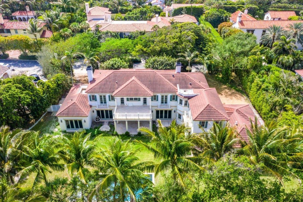 Beautifully designed Georgian Colonial on prime Estate Section ''El'' street ocean block. Custom built in 2013 with a gracious floorplan, high ceilings and over 9300 sf, this highly desirable 7 bedrooms/9.5 bathrooms includes 1 bedroom/1 bathroom guest/cabana house on 30,000 sf  +/- lot. Hurricane impact glass. A phenomenal opportunity to personalize your dream home!