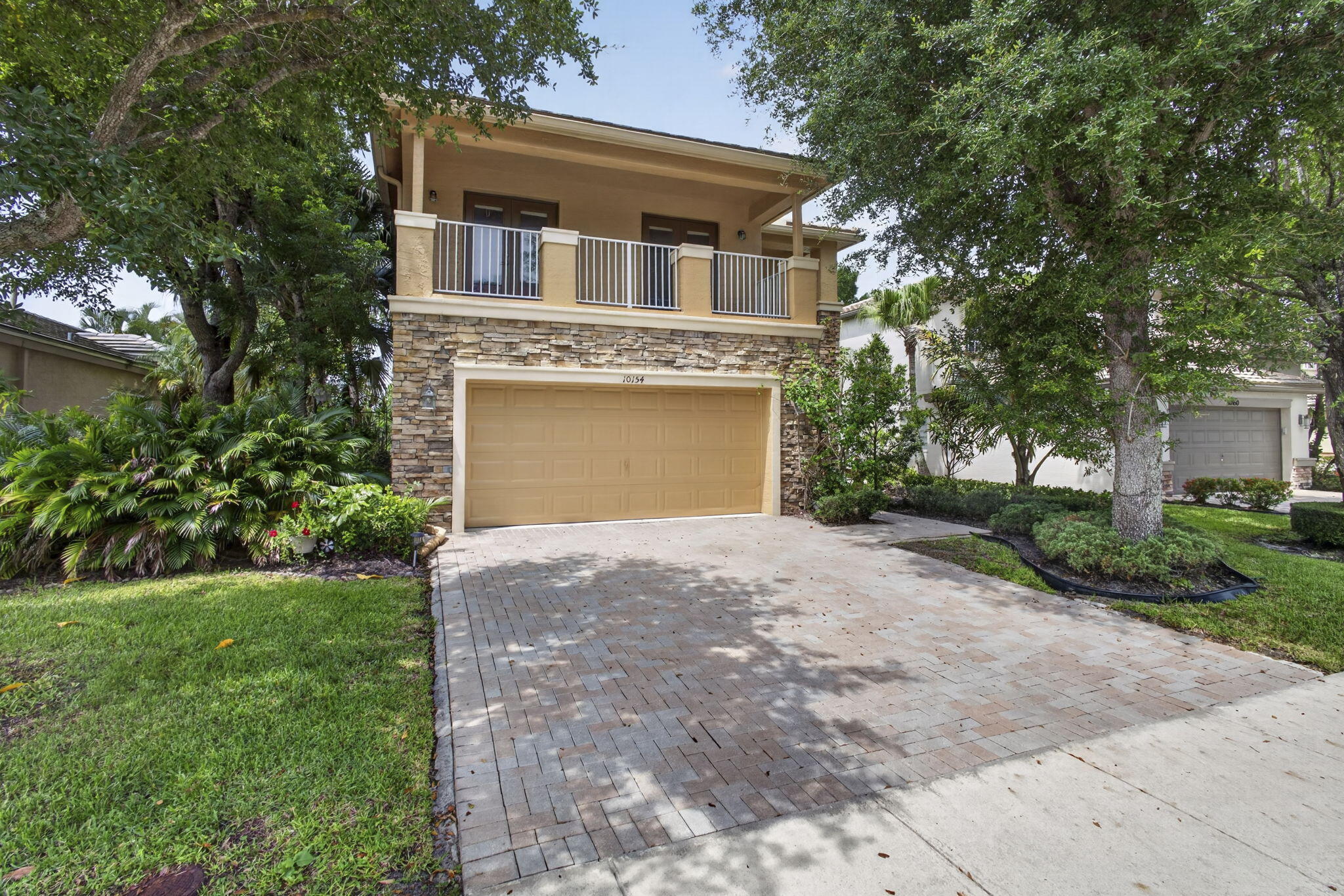 Welcome to the highly desirable neighborhood of Thoroughbred Lake Estates, where comfort, convenience, and resort style living come together.  Ideally, located near A rated schools, premiere shopping, dining, local airports, and south Florida's beautiful beaches.  This stunning two-story Residence offers the perfect place to call home. Featuring 4 bedrooms and 2 1/2 bathrooms. This beautifully maintained home boasts breathtaking lake and wildlife preserve views right from your own backyard.  Enjoy Florida living at its finest with your own private pool, perfect for relaxing afternoons, family barbecues, and year-round, entertaining.  The thoughtfully designed floor plan offers, generous living spaces, large bedrooms, and ample closet space for storage.  New wood look Floors have been installed throughout the entire home. Residents of Thoroughbred Lake Estates enjoy an Exceptional array of amenities, including a resort style pool, clubhouse with fitness center, Jacuzzi, scenic walking trails, Tot Lot playground, basketball and tennis courts. 24 hour security is also provided for your peace of mind. Don't miss the Incredible opportunity to own your own piece of paradise.  Schedule a private tour today!