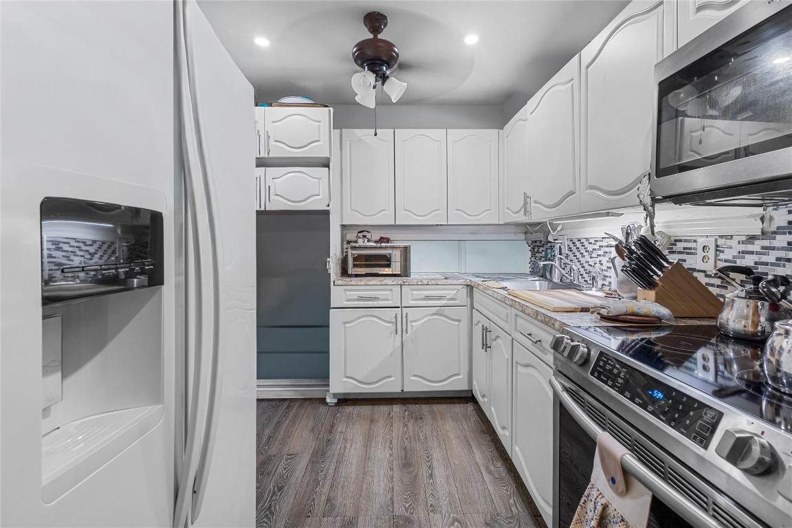 SELLER MOTIVATED!! Updated, spacious, and rarely available corner unit located in the Oakbrook 55+ community. Renovated in 2018, this 2-bedroom, 2-bath condo offers a desirable layout with extra windows providing ample natural light, along with impact windows installed in 2025. The building features a newly completed roof (2025), adding long-term value. Community amenities include ample resident and guest parking, a welcoming lobby, clubhouse hall, fitness center, library, tennis and shuffleboard courts, large pool and patio area, on-site laundry facility with new machines, and peaceful walkways. Conveniently located near shopping, dining, medical facilities, and major roadways. Move-in ready and a must-see opportunity, don't miss this one!