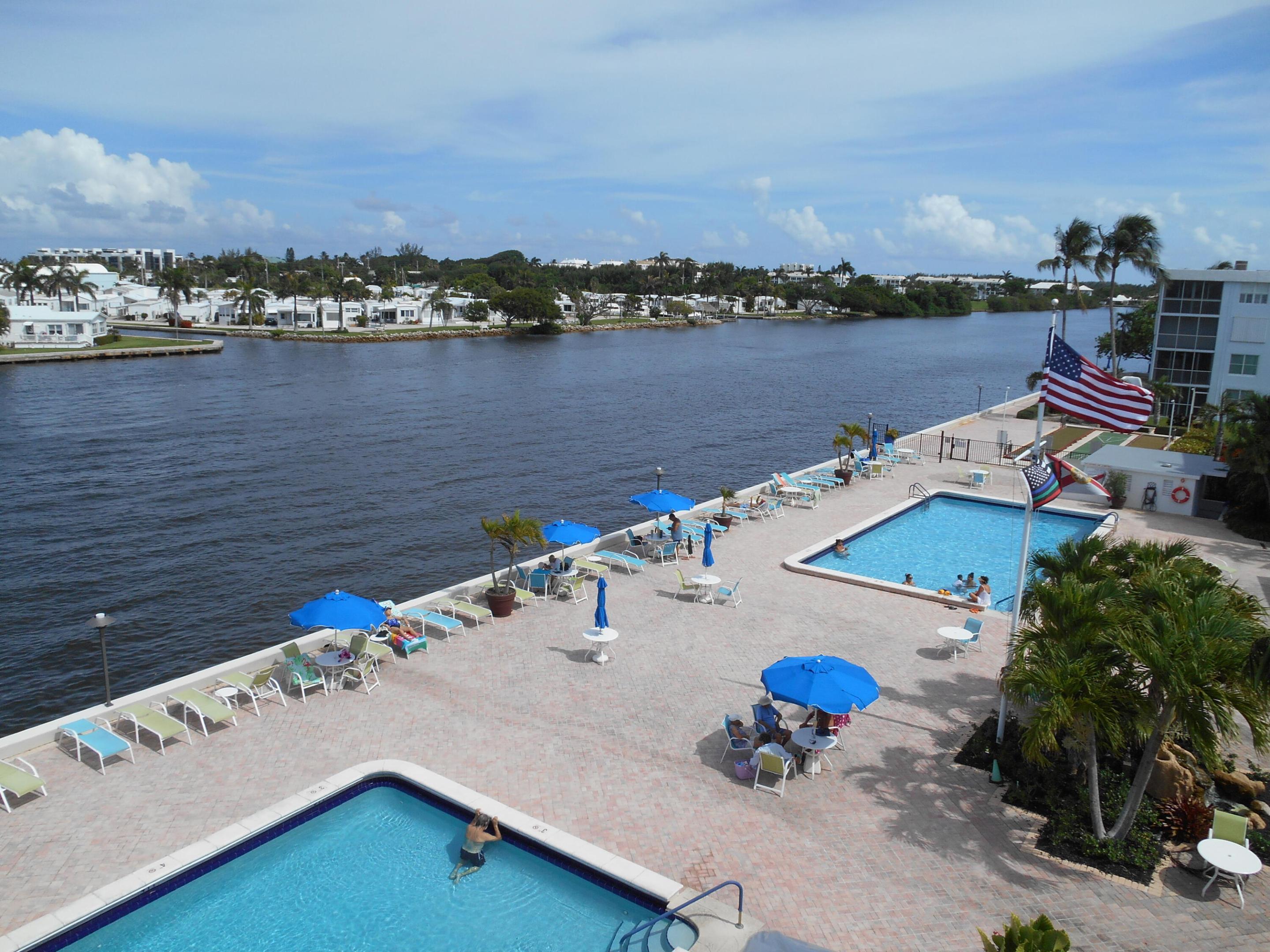 (PLEASE NOTE:  55+ COMMUNITY) BRING YOUR FUSSIEST TENANT TO THIS TURNKEY, AMAZING CONDO!  This community is right on the water and with 2 large pools, it has everything you need to enjoy Florida living all year round!  Lots of community activities and close to everything:  I-95, good places to eat, Publix, and the beach!
