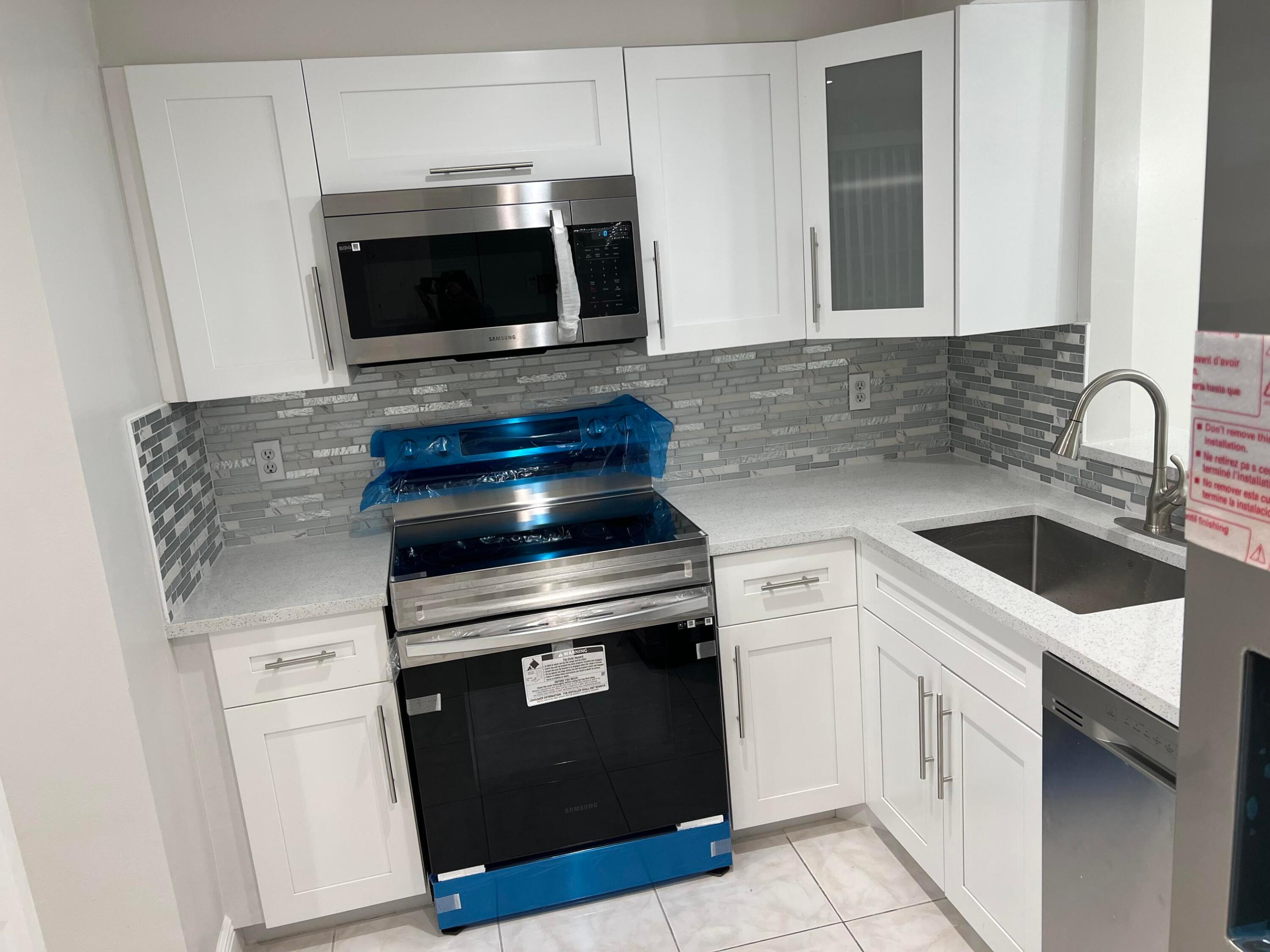 VILLAGES OF ORIOLE ABBEY CONDO - Residential