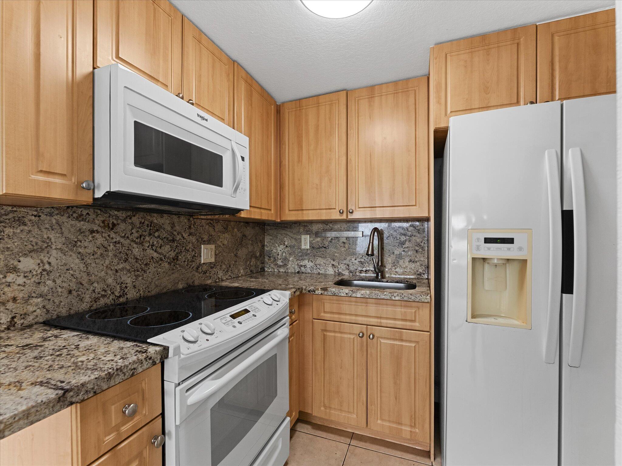 Welcome this ground floor corner unit.  It is a great 2 bedroom and 2 bathroom layout that feels bright and welcoming. The entire place has clean tile flooring and impact windows. Best of all, you have your own in unit washer and dryer.   The location is tough to beat. You are just a short drive from the beach, local parks, and plenty of restaurants. When you want to stay close to home, you can just step outside to the community pool or grill up some dinner in a barbecue.  Rentspree is used for a background check and tenant must pay 150.00 for HOA approval which takes 3-4 weeks. It can be expedited for an extra fee. 600 minimum credit score. No pets. One assigned parking space, that can fit two cars. Supra