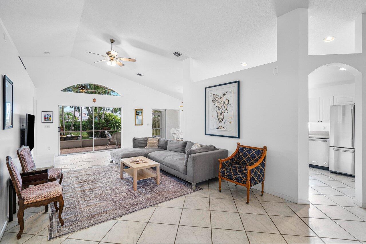 Open floor plan with high ceiling full of natural light. Walking distance from the Wellington mall, restaurants, shopping and entertainment. This is one of the most desirable layouts of the single story single family home in Wellington Edge with two large sliding glass doors in the living room, a large patio, separate laundry room and an oversized garage. The gated community of Wellington's Edge has beautiful trails and is conveniently located near A-rated schools. Residents enjoy access to three swimming pools, tennis courts, a fitness center and a playground.