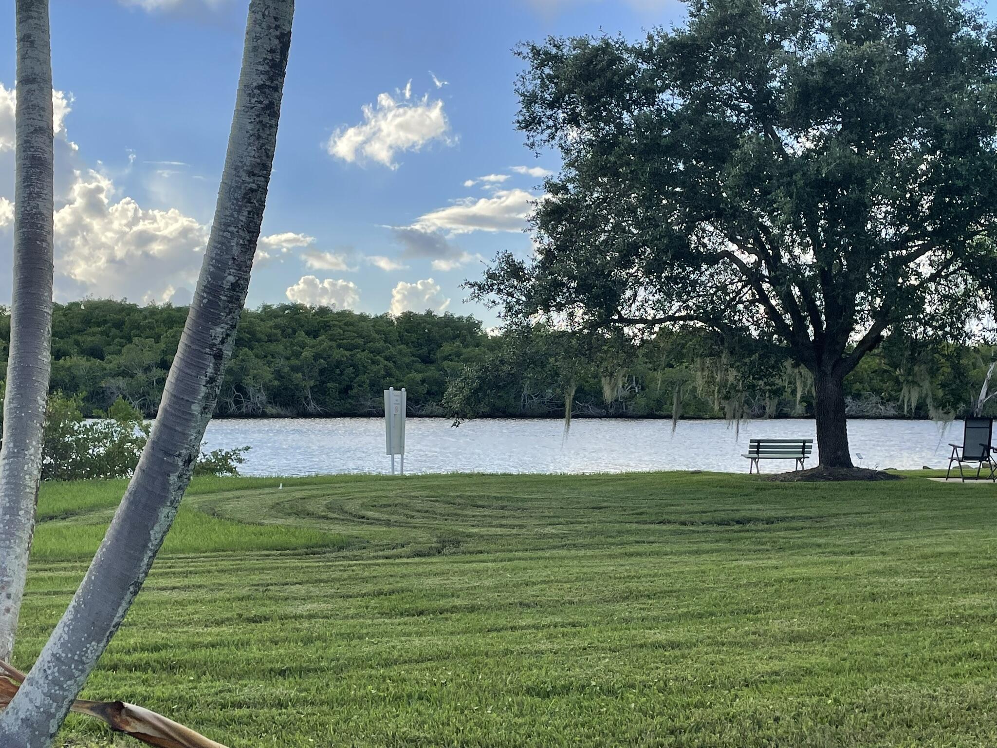 Beautiful water view in desirable Riverland Mobile Home Waterfront Co-Op Community!  2 Bed 1 Bath and 1/2 Bath in this active 55+neighborhood.  Plenty of space to park. Furnished, New water heater, Recently Roof sealed & painted. All Duct work replaced. Newer AC. No flood insurance required. Community includes clubhouse, shuffleboard, social activities and heated pool. HOA fee includes water, sewer, landscaping, and basic cable/internet.  Community conveniently located near river, beaches, dining and shopping.  Community also offers optional boat dockage.   Golf Cart included with full price offer.