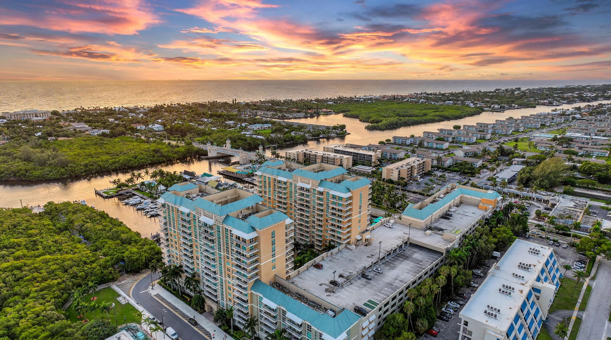 Amazing ocean and intracoastal views from this SE corner 3 bedroom, 2 bath condo with a wraparound balcony.  Boasting a wrap around balcony, beautiful tile floors, crown molding through out and a brand new A/C, this furnished/turn key condo is a must see. This premium positioned condo offers complete privacy and panoramic ocean views throughout. Marina Village has a dockage available for purchase or rent, fitness center, billiard room, movie theatre, business center, club room and is within walking distance to beautiful beaches, restaurants and charter fishing boats. Just minutes from Atlantic Ave and I95. This is an investor friendly building. Condo fee includes basic cable, wifi and water. ASC HAS FULL RESERVES!