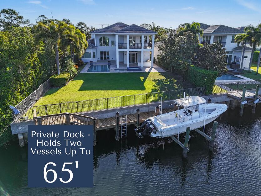 Commanding an extraordinary position along a private canal with sweeping, direct Intracoastal views, this stunning waterfront estate embodies the pinnacle of Palm Beach luxury and maritime living. With a 45-foot private dock, Hi Tide Topless 12,000 lb boat lift, and capacity for a 65-foot yacht or multiple vessels, the residence offers effortless deep-water access with no fixed bridges, and no wake zone, just moments from the Atlantic. Perfectly situated on a premium cul-de-sac homesite within the exclusive, guard-gated enclave of Frenchman's Harbor, the property delivers both exceptional privacy and breathtaking panoramic vistas—an unmatched sanctuary for the discerning boating enthusiast. The estate's prime canal-front vantage point provides unobstructed sight lines down the waterway and an uncommon feeling of openness rarely found in South Florida. Spanning over 5,000 square feet, this rarely available Delena model welcomes you with a grand double-door entry into a dramatic 24-foot foyer, where walls of glass frame tranquil water views. A sculptural staircase and sunlit interiors establish an atmosphere of elevated coastal sophistication throughout.  Designed for intimate living and grand-scale entertaining alike, the chef's kitchen is appointed with Wolf and Sub-Zero appliances, custom cabinetry, and an expansive waterfall island. The space opens seamlessly into the living and dining areas, where sliding glass walls dissolve the divide between indoors and out. Beyond lies a resort-style lanai featuring a Twin Eagles summer kitchen, covered entertaining pavilion, and a sparkling pool with sun shelf and spa, all overlooking the manicured grounds and shimmering Intracoastal backdrop.  The main-level primary suite is a serene retreat offering dual walk-in closets, a spa-inspired bath with soaking tub and oversized shower, and an adjoining private den ideal as an office, nursery, or fitness space. The first floor also includes a guest suite with private bath, formal living and dining rooms, a powder room, and a dedicated office each space curated with refined balance and timeless elegance.  Upstairs, a spacious loft connects five additional bedrooms, including a versatile bonus suite with its own ensuite bath, perfect as a media room, guest quarters, or lounge. French doors reveal an expansive terrace capturing spectacular sunset views over the Intracoastal, creating an exquisite setting for al fresco dining or evening cocktails.  Additional luxuries include a three-car garage with epoxy flooring, extended driveway, impact-rated windows and doors, and a dedicated pool bath.  Set within Frenchman's Harbor, one of Palm Beach County's most prestigious waterfront enclaves, owners enjoy 24-hour manned security, exceptional deep-water dockage, and proximity to world-class beaches, golf, fine dining, and luxury shopping.  With its unrivaled vantage point, rare dockage capabilities, and architectural sophistication, 13965 Willow Cay Drive stands as a true statement of distinction, a legacy estate of exceptional caliber on South Florida's Gold Coast.