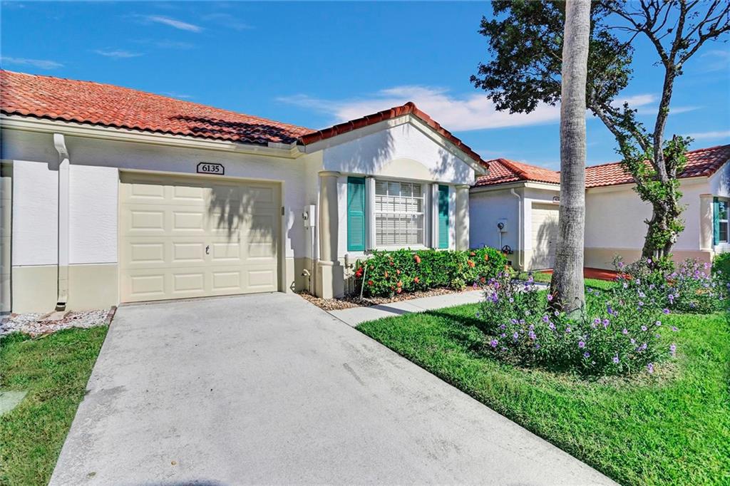 Coming Soon! Beautiful Lake View Villa In Floral Lakes. 2 Bedroom 2 Bathrooms With One Car Garage. Interior Features Include Private Screened In Entrance, Light And Open Floor Plan, Remodeled Kitchen With Modern Cabinets and Under Counter Lighting, Granite Countertops, Eat In Kitchen Area. Spacious Primary Bedroom With Beautiful Lake Views, Large Walk In Closet. Exterior Features Include Oversized One Car Garage, Accordion Hurricane Shutters, Screened In Outdoor Patio with Beautiful Lake Views. Updated Clubhouse With Resort Pool, Fitness Center, Social Hall For Shows and Parties, Billiards, Card Room. Active Community 55 and Older. Priced To Sell!