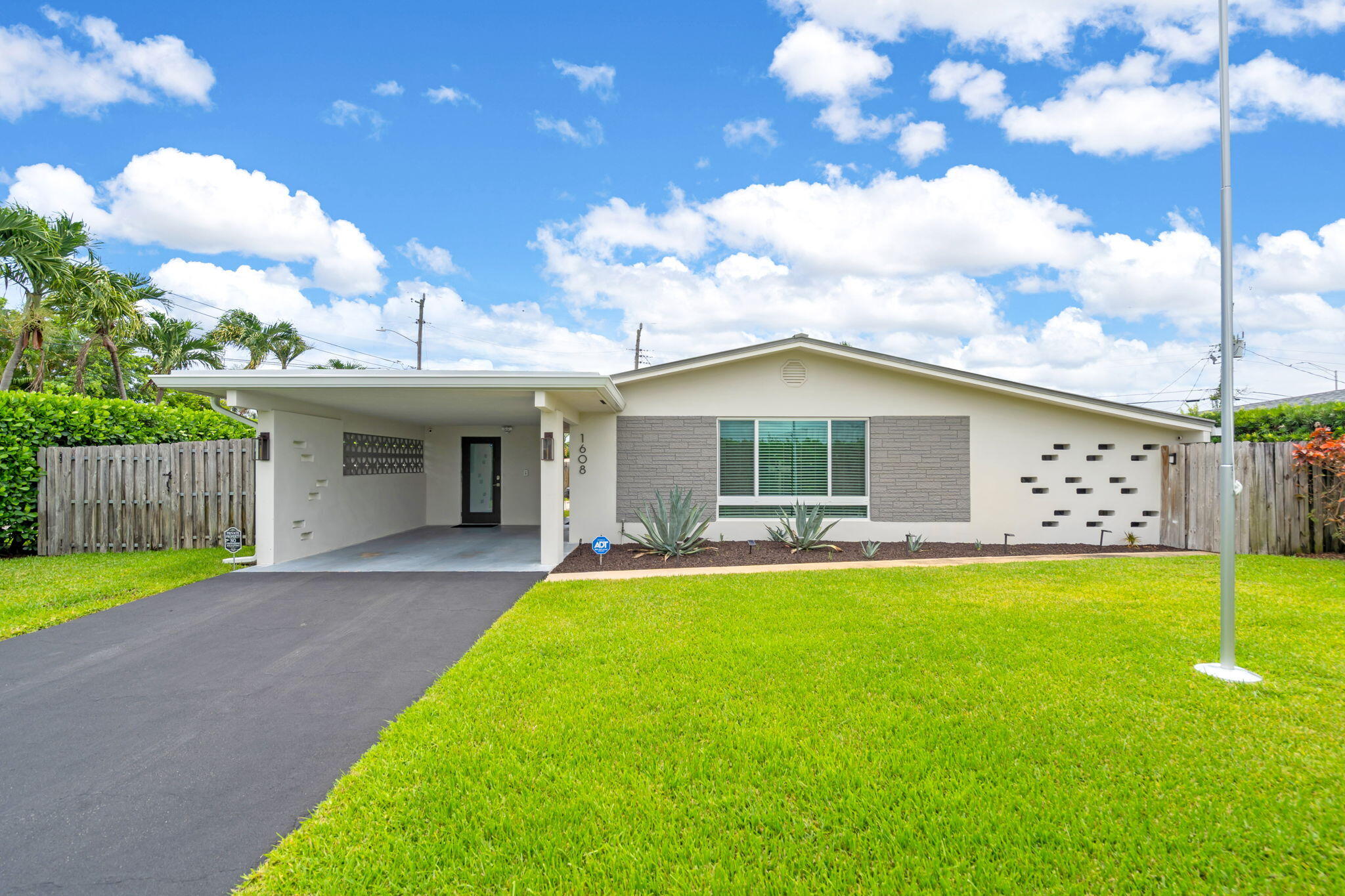 Turnkey 3-bedroom, 2-bath home in the desirable Poinsettia Heights neighborhood! Extensively upgraded with a new metal roof (2025), new 7-inch gutters, new HVAC system with all-new ductwork, UV air purification system, and hurricane-impact windows and doors with energy-efficient Low-E glass. The exterior was completely re-stuccoed and freshly painted in 2025.  Enjoy a custom-screened patio, solid wood interior doors, irrigation well with water treatment system, and a hurricane-rated aluminum shed. The spacious fenced backyard offers plenty of room to add a pool and features oversized side gates with secure space for boat, trailer, or recreational vehicle storage. Ideally located just minutes from Fort Lauderdale Beach, Las Olas, shopping, dining, and entertainment. Move-in ready!