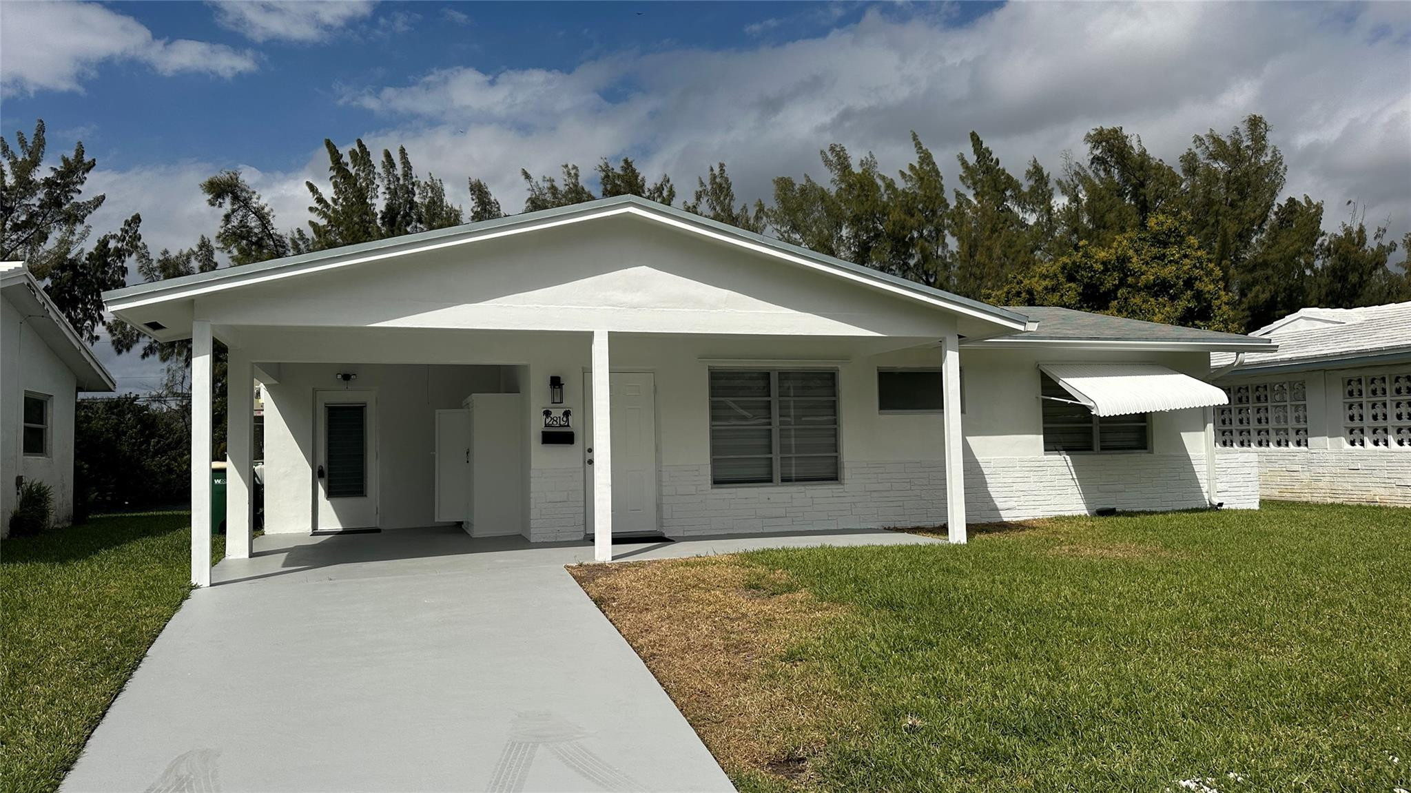 Fully Renovated 2/2 Single Family Waterfront Home w/ Many Updates & Features in Desirable Tamarac Lake North! Updates - A/C Unit (2025), Appliances (2024) – SS Double Door w/ Pullout Freezer Drawer + In-door Water Pitcher, SS Wall Oven/Microwave, SS Dishwasher, and Glass Cooktop, and Water Heater (2023). Other Features - Two Custom Slider Kitchen Windows, High Impact Front Door, New Vinyl Flooring Throughout, New Bathroom Cabinets + Mirrors with Flooring, and New Modem Kitchen w/ Pullout Drawers. Other Amenities include low HOA fees for lawn service and access to community pool overlooks beautiful lake view. Easy access to renovated Caporella Park, friendly walkable neighborhood and easy access to I-95 & Turnpike, and panoramic view to tree lined waterfront oasis and plenty of FL wildlife.