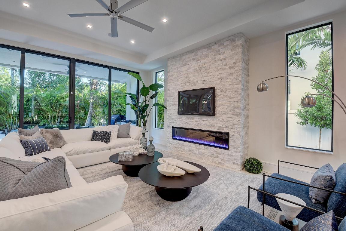 *****REDUCED $300,000 and READY FOR MOVE IN*******This is the only new construction ready for immediate move-in in the  boutique beachside neighborhood  of Por La Mar.  Over 4300 sq. ft. allows for easy living and entertaining inside and out.  First floor has the main living/dining area with spectacular gourmet kitchen including Wolf and Subzero appliances with multiple ovens.  Doors open to a covered balcony where a salt-water pool awaits.  En-suite guest bedroom or office also downstairs. Upstairs is a huge primary suite with a covered balcony, extra large bathroom with 2 sinks and WC's, separate tub and shower and oversized walk-in closet.  The second floor also has two additional en-suite bedrooms, an open loft/media area and additional  laundry area.  Home h elevator, natural gas, generator and so much more!  This unique home is located on the island which allows  steps to the beach, restaurants, downtown Boca Raton and the new waterfront Park on the intracoastal.