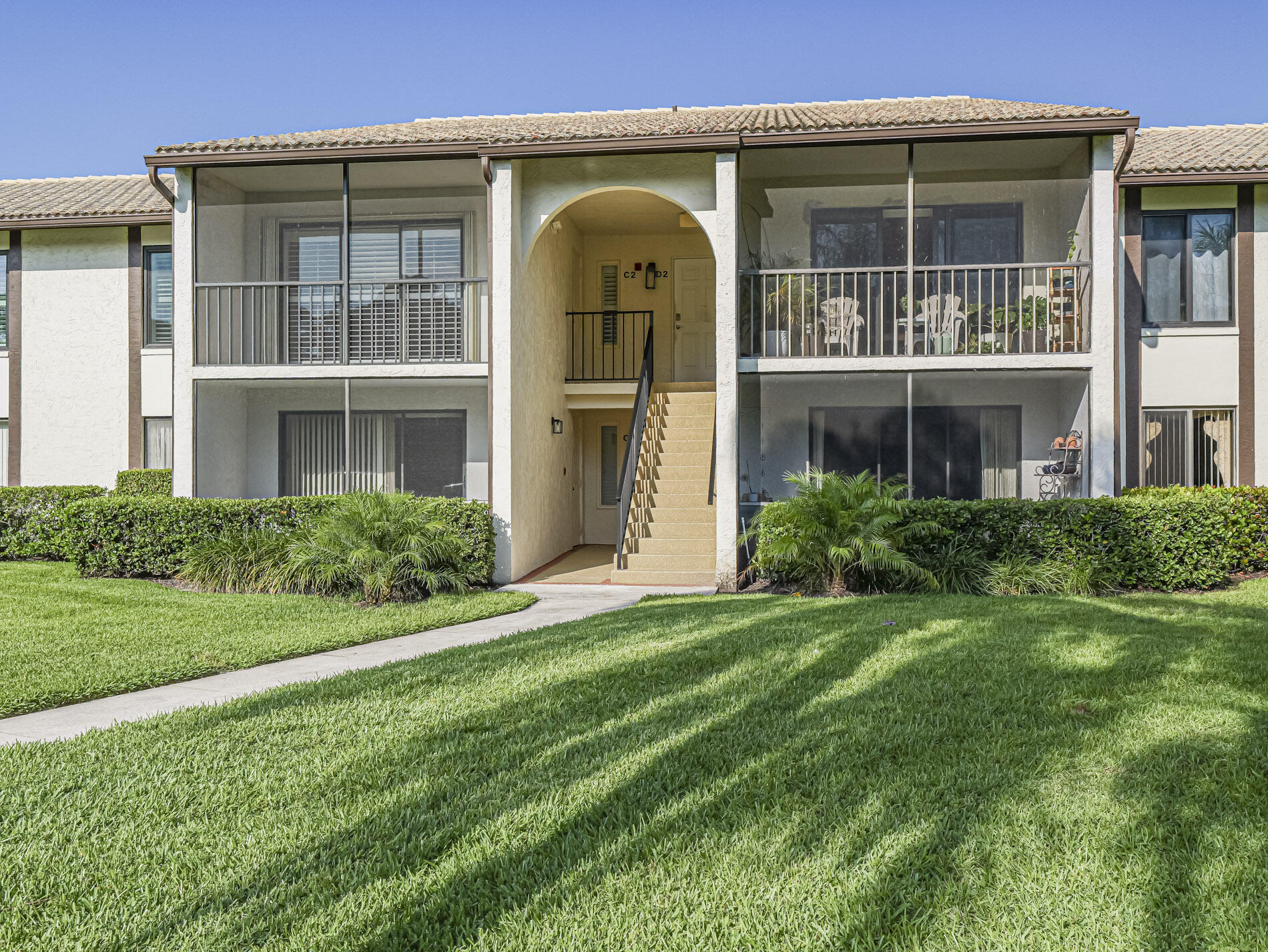 Welcome to Pine Ridge in Palm City! This beautifully maintained 2-bedroom, 2-bath second-floor condo is filled with natural light and offers a spacious balcony, perfect for morning coffee or evening relaxation. Features include an updated kitchen with Granite countertops, stainless steel appliances, luxury vinyl flooring, a walk-in laundry room, impact windows, and a spacious primary suite with walk-in closet and ensuite bath. Enjoy gated security, a heated/cooled pool, spa, tennis, pickleball, bocce, clubhouse, and on-site management. HOA includes cable and building insurance. Minutes to shopping, dining, beaches, I-95, the Turnpike, and located in an A-rated school district. No leasing for the first 2 years.