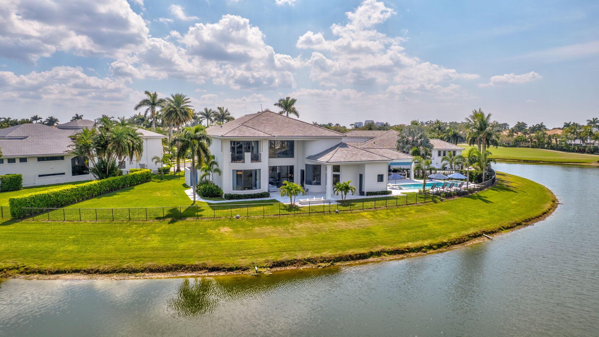 CUSTOM ESTATE with Panoramic Water & Golf Views in a Prestigious Location.
COMPLETELY RENOVATED in 2022 | An ENTERTAINERS DREAM HOME!
Discover luxury redefined in this custom 5-bedroom + office, 8-bathroom estate, completely transformed in 2022. Perfectly positioned at the end of a private cul-de-sac on nearly half an acre, this exceptional home offers unparalleled panoramic lake and golf course views. With a gourmet chef's kitchen, spa-like bathrooms, Expansive Outdoor Entertaining space and exquisite design throughout, this is a home where sophistication meets comfort.
Refined Elegance & Thoughtful Design
From the grand foyer to the expansive living spaces, every detail has been curated for an effortless blend of luxury and function.
• Primary Suite Retreat - " Primary Suite Retreat - Wake up to breathtaking views in a serene sanctuary featuring his-and-her spa-like bathrooms, a flex space with a built-in coffee bar, and a grand outdoor shower.
" Four Additional Spacious Guest Suites - Each offering comfort, style, and privacy.
       One of the 4 Guest Suites is a secondary Master with a balcony overlooking the water and Golf Course
" Eight Exquisite Bathrooms - High-end fixtures and spa-inspired finishes elevate every space.
Chef's Kitchen & Seamless Entertaining Spaces
Designed for culinary enthusiasts and entertainers alike:
" Gourmet Chef's Kitchen - Completely reimagined with top-tier appliances, custom cabinetry, two dishwashers, warming drawer and premium countertops.
" Wine Enthusiasts Delight with Wine Coolers to accommodate over 200 bottles. 
" Expansive Double Island - A stunning centerpiece, seamlessly flowing into the dining and living areas for effortless gatherings.
" Sophisticated Living Room - Floor-to-ceiling windows showcase breathtaking views, complemented by a cozy fireplace.
Resort-Style Outdoor Oasis
A true showstopper, the resort-inspired outdoor space is designed for both relaxation and grand entertaining.
" Spectacular Pool & Lounge Area - Featuring shelf chaise lounges and ample seating.
" Expansive Covered Bar & Lounge - The perfect space for hosting or unwinding.
" Firepit Seating Area - Enjoy cozy nights under the stars.
" Large Landscaped Side Yard - Ideal for recreation or additional outdoor space.
" Meticulously Designed Backyard - Thoughtfully landscaped to maximize the stunning surroundings.
Full House Generator
Move-In Ready | Designer Furnishings Negotiable
Offered with negotiable designer furnishings for a seamless transition into luxury living.
This exceptional home is more than a residence...it's a lifestyle. Schedule your private tour today!