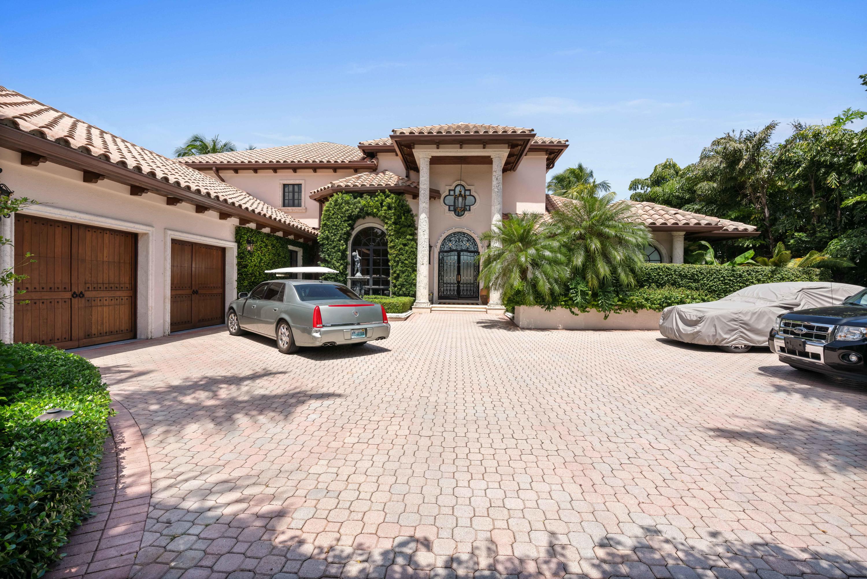 An outstanding waterfront custom home. Most gracious and appealing feeling as you enter this elegant, most liveable floor plan featuring superior quality throughout.  Stylish master bedroom and new state-of-the-art bath.  New large pool and spa alongside the outdoor kitchen.  Hurricane impact glass, large gated courtyard driveway.  Too much more to describe, a must-see!!!