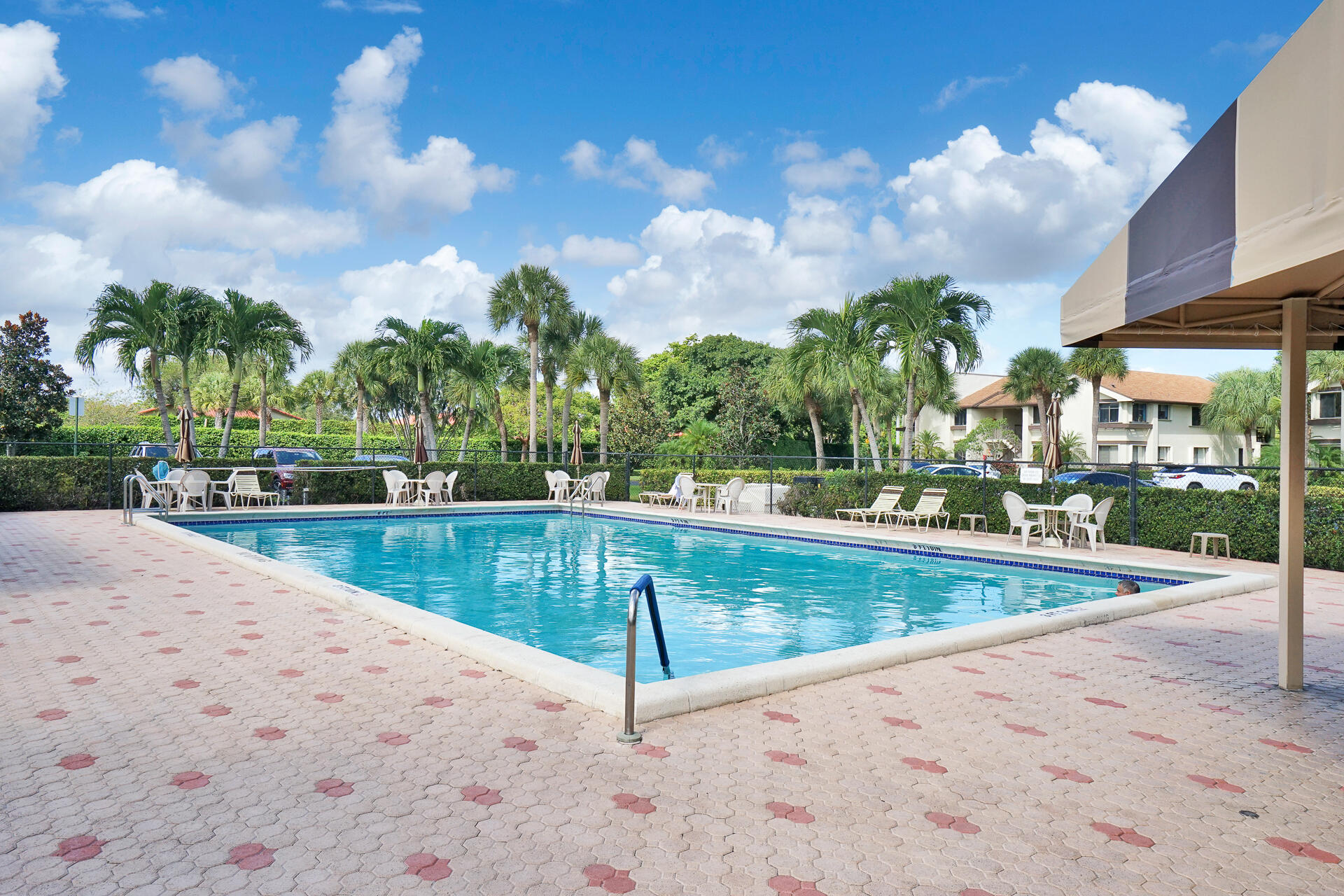 STUNNING 2ND FLOOR CORNER UNIT OVERLOOKING THE 5TH HOLE OF PINE ISLAND RIDGE COUNTRY CLUB. THIS SPACIOUS RESIDENCE FEATURES VAULTED CEILINGS AND OPEN LIVING AREAS FILLED WITH NATURAL LIGHT. LARGE UPDATED KITCHEN WITH AMPLE CABINETRY. GENEROUS PRIMARY BEDROOM WITH UPDATED BATHROOMS. LVP FLOORING THROUGHOUT. ENJOY SERENE GOLF COURSE VIEWS FROM YOUR GLASS ENCLOSED PATIO. JUST STEPS TO THE COMMUNITY POOL. LOCATED IN A PRIVATE ALL-AGES COUNTRY CLUB COMMUNITY OFFERING RESORT-STYLE AMENITIES INCLUDING GOLF, TENNIS, PICKLEBALL, FITNESS CENTER, SAUNA, STEAM ROOM, SWIMMING POOL, SPORTS BAR, AND FULL-SERVICE DINING.  PRIME LOCATION CLOSE TO I-595 FOR EASY COMMUTING AND MINUTES TO NOVA SOUTHEASTERN UNIVERSITY AND ALL MAJOR DAVIE COLLEGES.