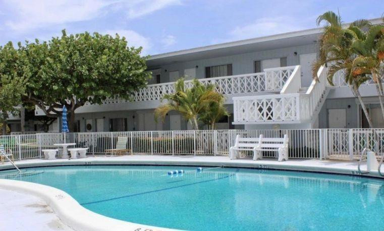 Major Price reduction. This nicely remodeled ground floor w/ view of pool and common green area.  unit has laminate flooring,  granite countertops, newer appliances and updated bathroom.  Wonderful closet and storage space.  Great location, central to all main traffic arteries and close to beach, hospitals, shopping and restaurants.  Grounds are very inviting and there is laundry on premise.  Ample guest parking available.  Note:  per management, must have over 700 credit score.