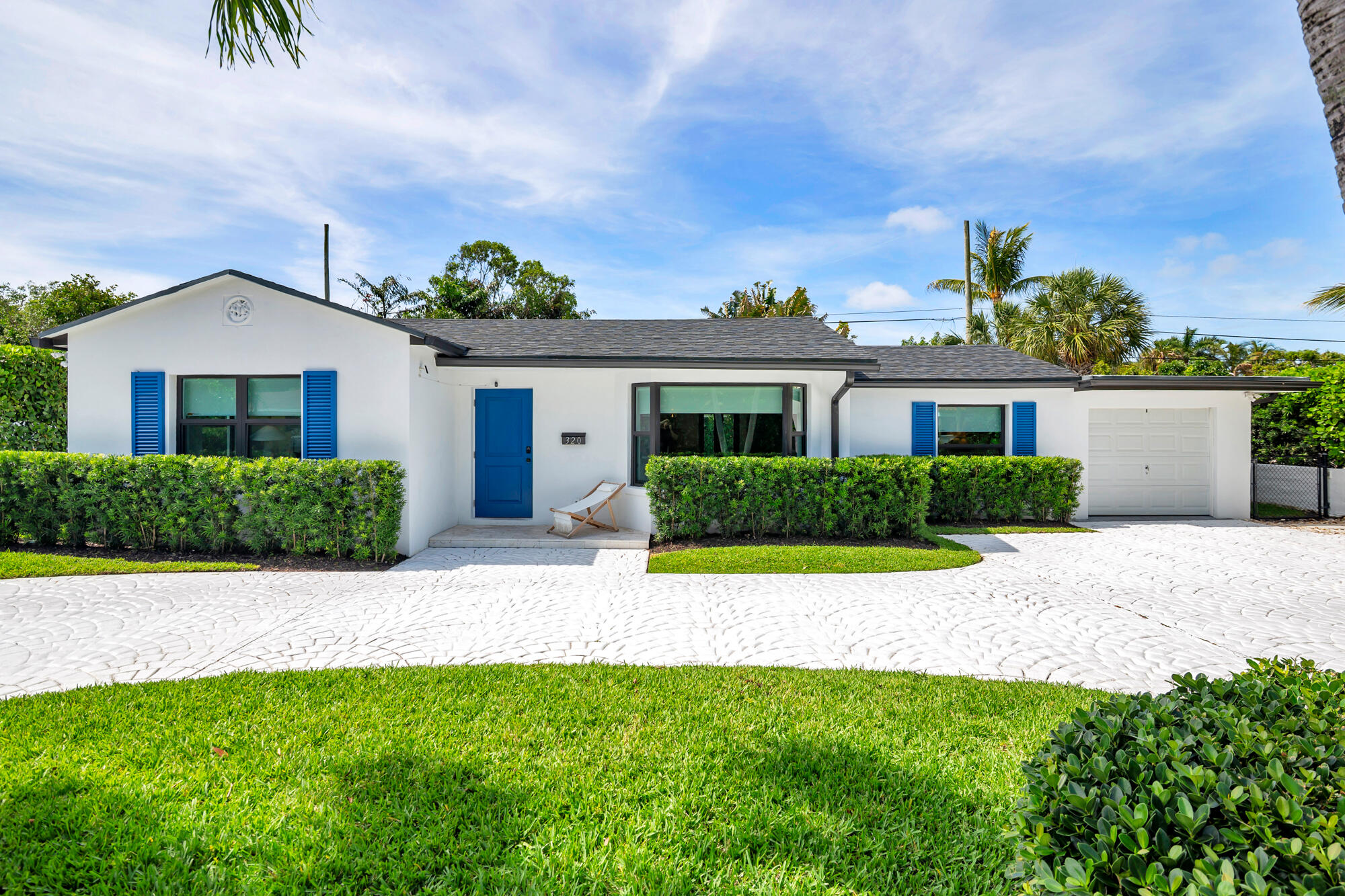 Fully renovated in 2021, this stunning three-bedroom, two-bath residence is located in the highly sought-after "South of Southern" neighborhood. Thoughtfully redesigned by Blueline Construction, the home was taken down to the studs and rebuilt with exceptional attention to detail and quality craftsmanship. Offering 1,548 square feet of living space and 1,946 total square feet, the home features all-new impact windows and doors, a new roof, updated plumbing and electrical systems, new air conditioning, and a beautifully designed pool with an outdoor shower. The oversized primary suite includes dual closets, a double vanity, and a spacious walk-in shower. Two additional bedrooms share a beautifully appointed bathroom with a custom vanity and a shower/tub combination. White oak hardwood  floors run throughout the home, complemented by stainless steel appliances, a large kitchen island, and an open-concept family room designed for both comfortable living and effortless entertaining. Every detail has been carefully curated to create a move-in-ready home that blends modern luxury with timeless style.