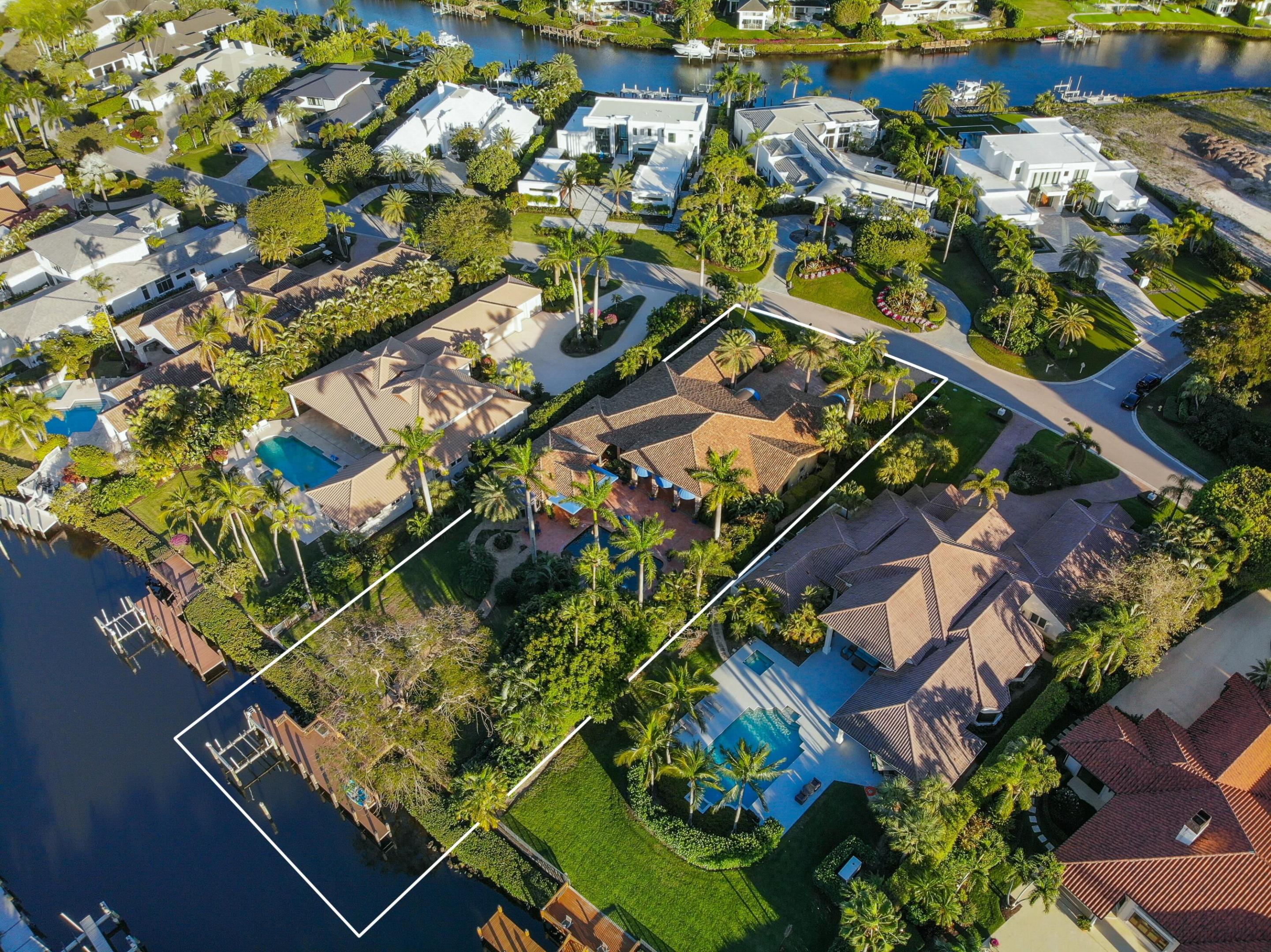 Located in the prestigious Frenchman's Creek Golf Club, this exceptional Old Spanish-style estate combines timeless elegance with modern comfort. Situated on a 30,000 sq ft lot with 107 feet of navigable waterfront and a private boat lift, this is a rare opportunity for boaters and luxury seekers alike.
This single-story residence offers 7,840 total square feet, with 5,539 sq ft under air. The home features 5 bedrooms, 5 full bathrooms, and a powder room. One of the bedrooms is a detached guest house with stunning views of the water—ideal for guests seeking privacy and tranquility. The primary suite includes two private offices, creating a versatile space for work or relaxation.
The interior boasts authentic Old Spanish character with expansive ceilings with pecky cypress beams. A spacious 3-car garage provides ample room for vehicles and storage. 
Enjoy the exclusive amenities of Frenchman's Creek, including world-class golf, tennis, spa, fine dining, and a private beach cluball within a secure, gated community.
