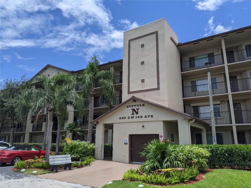 Desirable Corner Unit with Serene Nature Views. This highly desirable corner unit offers peaceful nature views and 1,533 sq ft of stylish, updated living in a secure 55+ gated community. The remodeled kitchen features sleek modern cabinetry, granite countertops, stainless steel appliances, updated lighting, and a double oven, creating a perfect blend of function and contemporary design. The home includes a built out attic with lighting and pull down stairs—ideal for storage—along with a full size washer and dryer for added convenience. Enjoy the elegance of sleek tile flooring that flows seamlessly throughout the entire space, enhancing the home's clean, modern aesthetic. Both bedrooms are generously sized, and the two updated bathrooms offer comfort