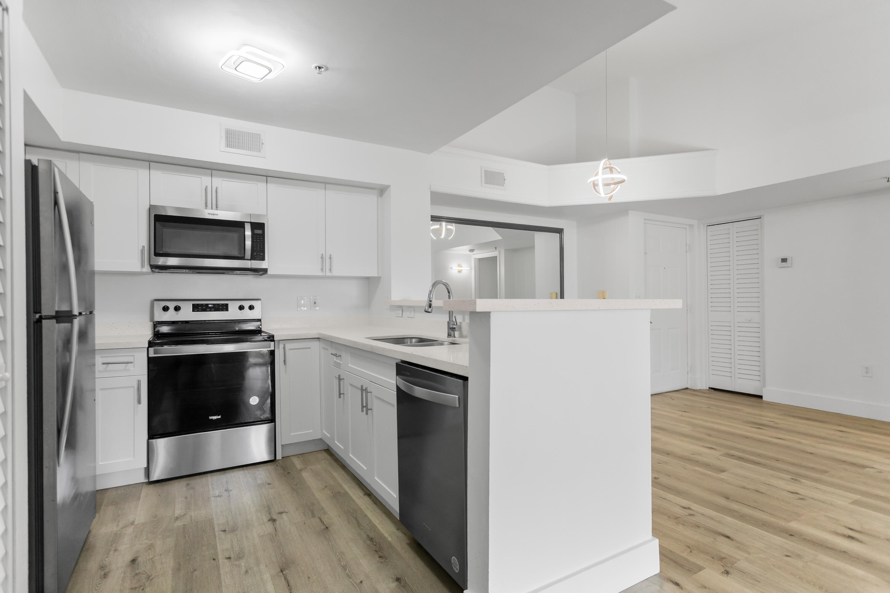 BEAUTIFUL COMPLETELY UPDATED 2 BEDROOM 2 BATH CONDOMINIUM IN SOUGHT AFTER THE ENCLAVE AT MIRAMAR GATED COMMUNITY! OPEN, SPACIOUS AND GOOD ENERGY FEEL UNIT. WOOD FLOOR THOROUGH OUT THE WHOLE UNIT. KITCHEN COMPLETELY UPDATED W/ WOOD CABINETS, GRANITE COUNTER TOPS & WHITE APPLIANCES! LARGE MASTER BEDROOM W/WALK IN CLOSET! BIG MASTER BATHROOM W/ SEPARATE SHOWER & ROMAN TUB. LARGE SECONDARY BEDROOMS W/LARGE CLOSETS. SECONDARY BATHROOM COMPLETELY UPDATED! OPEN PATIO THAT OVERLOOKS AN AMAZING LAKE AND POOL VIEWS! TONS OF AMENITIES! CLOSE TO MAJOR HIGHWAY! A+ SCHOOLS! RENT RIGHT AWAY!RESORT STYLE LIVING. GATED COMMUNITY FEATURING A VERY SPACIOUS SWIMMING POOL, JACUZZI, C LUBHOUSE, GYM, VOLLEYBALL COURT, TENNIS COURTS, AND ALSO A PLAYGROUND. CLOSE TO MAIN HIGHWAYS, AND TO SHOPPING MALLS.