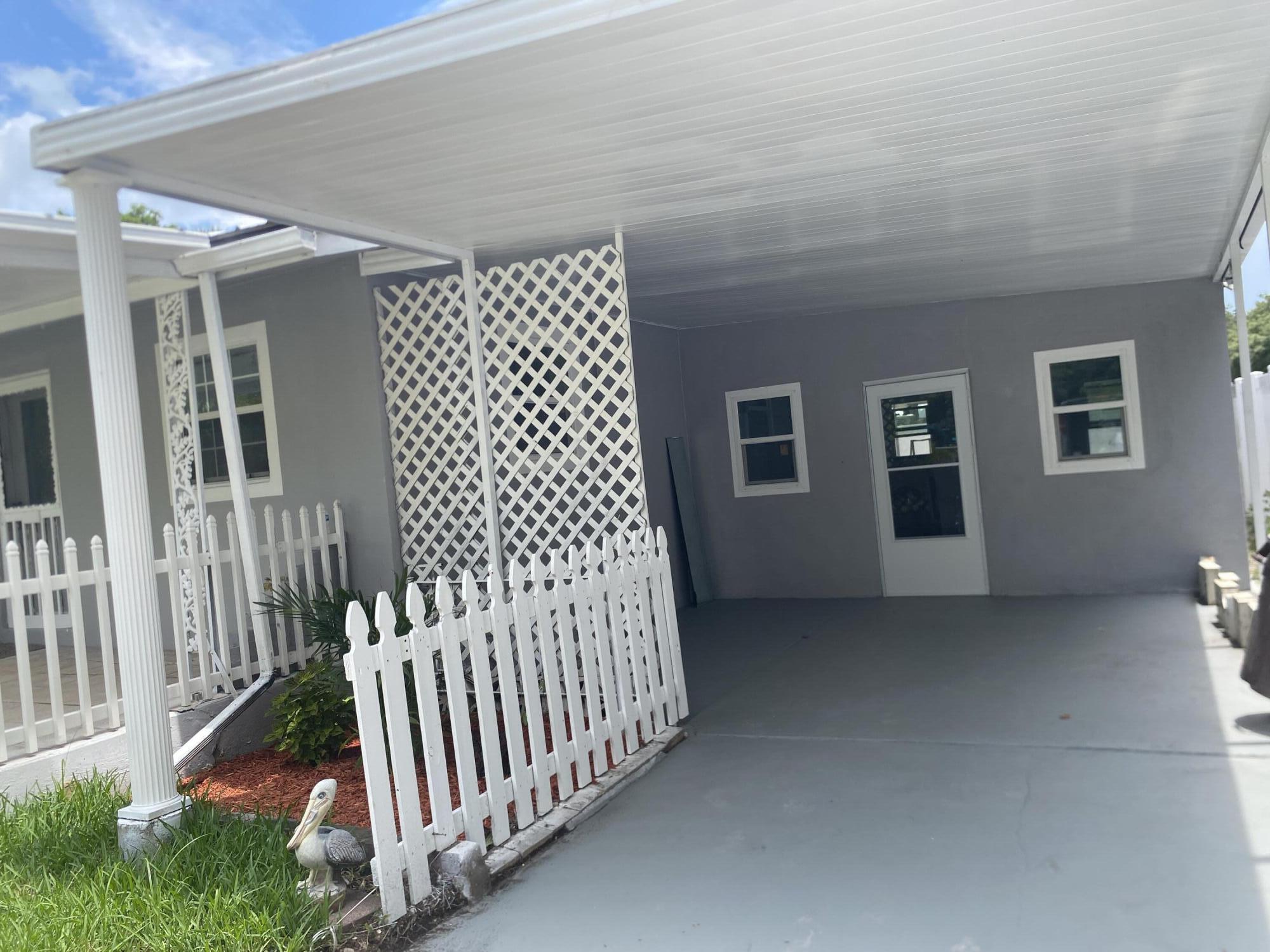 Welcome to this well-maintained 4-bedroom, 3-bathroom home offering 1,945 square feet of comfortable living space in a desirable Okeechobee location. Designed with both functionality and comfort in mind, this spacious residence provides plenty of room for guests, or those who simply enjoy extra space. Inside, you'll find a thoughtfully designed floor plan with generous living areas, comfortable bedrooms, and three full bathrooms to accommodate busy households. Natural light fills the home, creating a warm and inviting atmosphere throughout. One of the property's standout features is its two covered patios—one on each side of the home—providing multiple outdoor spaces for relaxing, entertaining, enjoying morning coffee, or hosting gatherings.