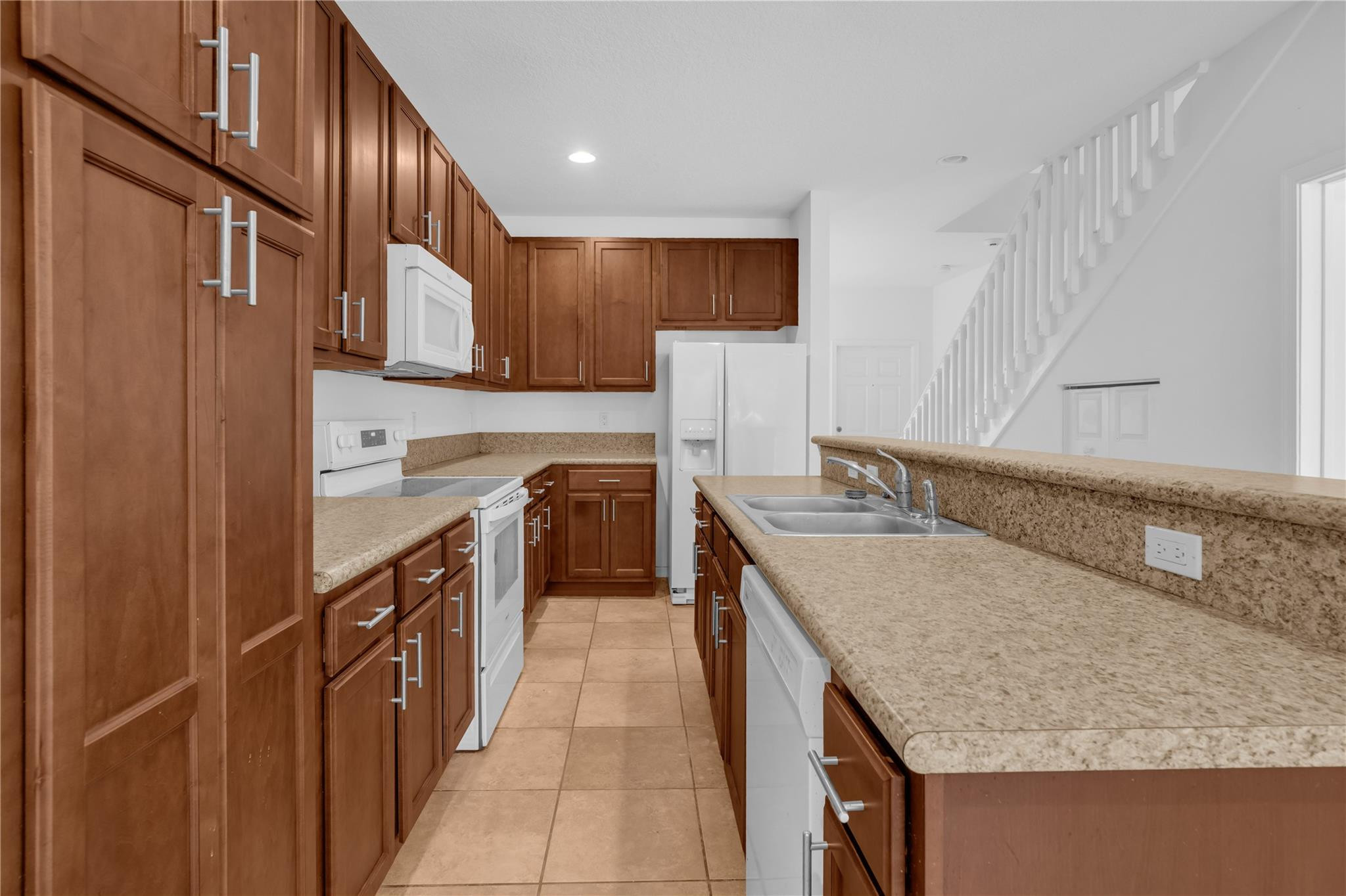 Spacious and functional layout- 2bed/2.5 bath, over 1400 sq ft of living space, and 2016 build. This townhouse has some of the lowest hoa fees in Broward. FMV is considerably higher than the price of this unit. Needs some work and is priced accordingly.  Sold As-is.