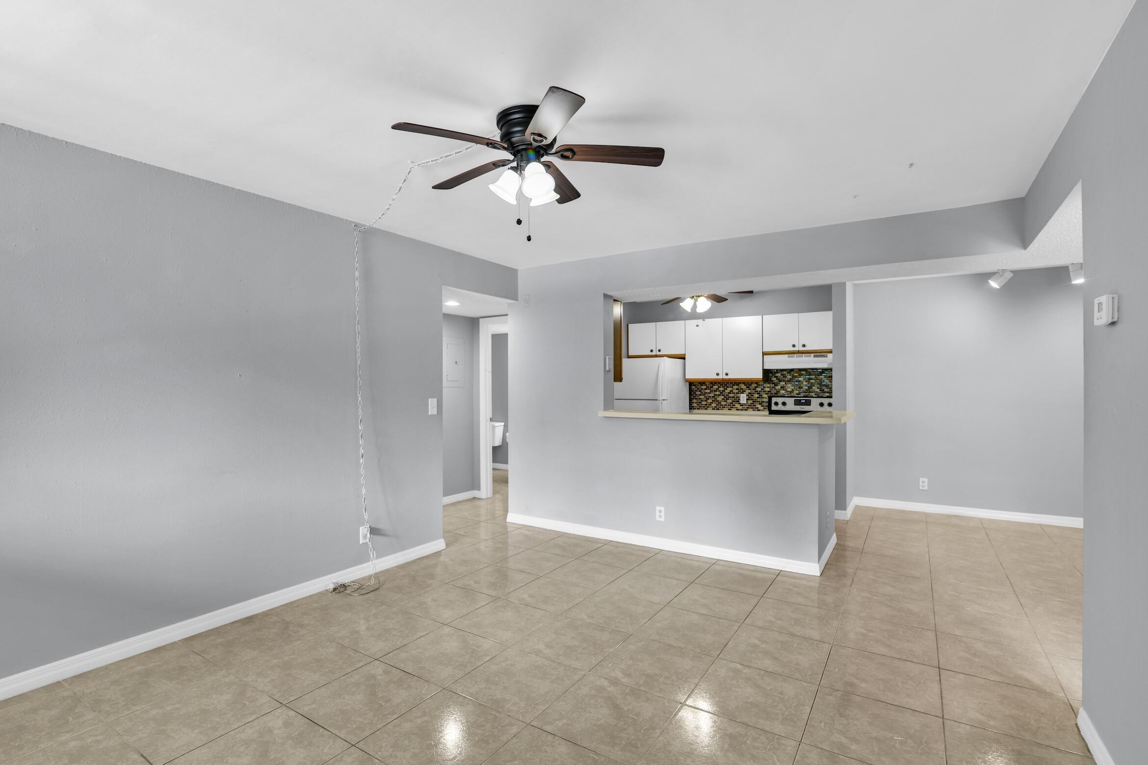 Welcome to Windward Lakes Community! This 2 bedroom Condo with split floor plan includes an in unit washer/dryer along with dishwasher, range, refrigerator, garbage disposal. The community amenities include pool, clubhouse, and gym and the entire community is currently being entirely painted for an updated look. Exterior painting and stucco work for this building to be completed this month.  Water is included and Tenant pays Electric.  Landlord will accept up to 2 dogs w/ 50lb maximum weight with additional monthly pet fee and security deposit (no cats). Resident must also apply for HOA approval prior to move in at $125 per adult applicant. Schedule a viewing today!