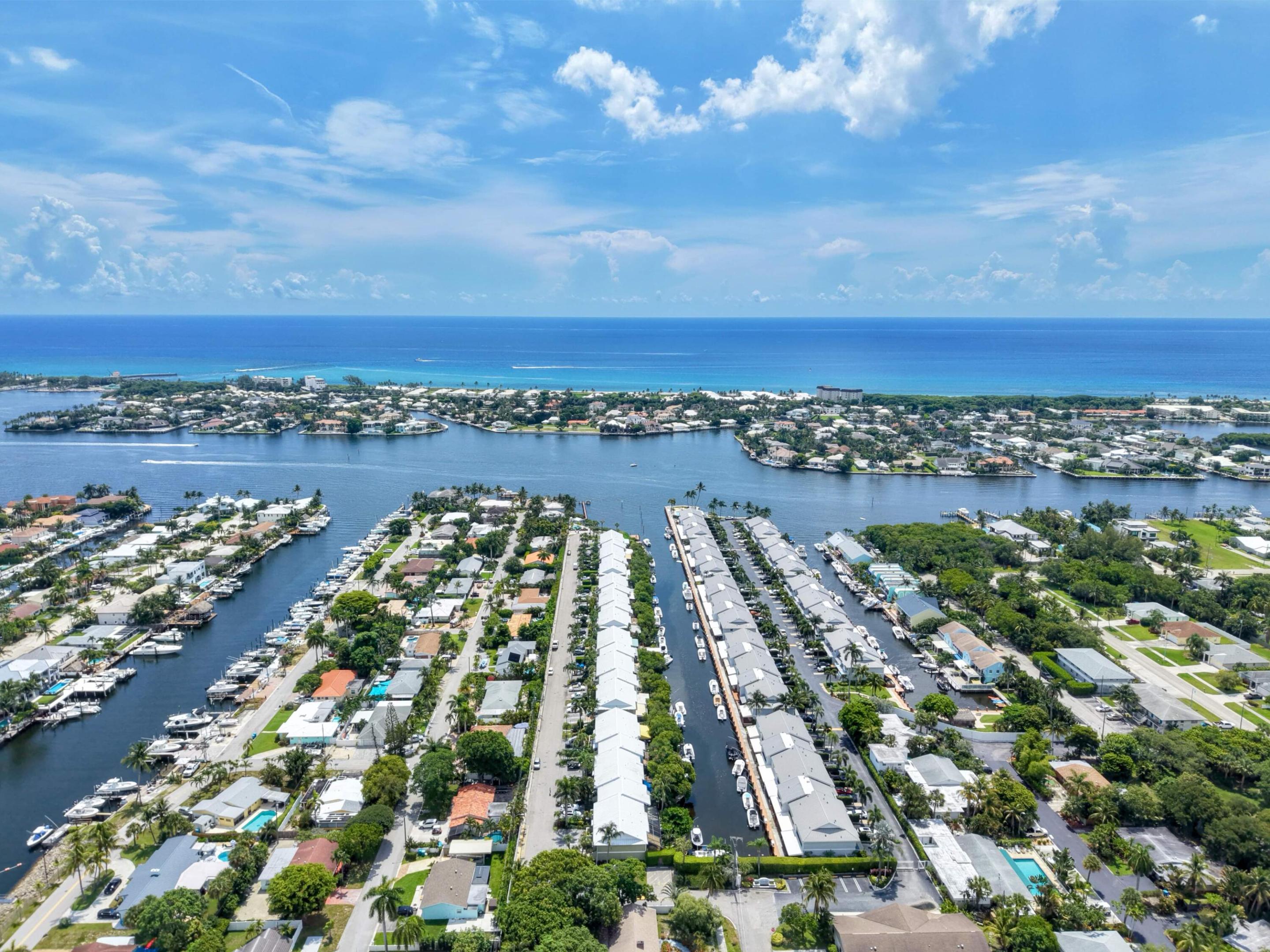 Seller Motivated, Priced to Sell Fantastic Waterfront Key West Style Townhouse, with Private Deepwater Boat Dock, This Community Allows Boat Lifts, No Fixed Bridges, Just Minutes to the Ocean!! Wonderful Open Floor Plan, 2 Bedrooms, 2 1/2 Bathrooms, Beautiful Granite Kitchen, Custom Solid Oak Staircase, Private Covered Waterfront Balcony off Primary Suite and Custom Cedar Walk in Closet, Private Large Outdoor Deck for Entertaining or Dinning Alfresco All While Enjoying Balmy Intracoastal and Ocean Breezes!! The Community is Gated and Has a Pool that is both Heated and Chilled, Gazebo and Community Day Dock, All Located Directly On the Intracoastal Waterway Providing Amazing Water Views! Time to Enjoy Waterfront Paradise Everyday!!