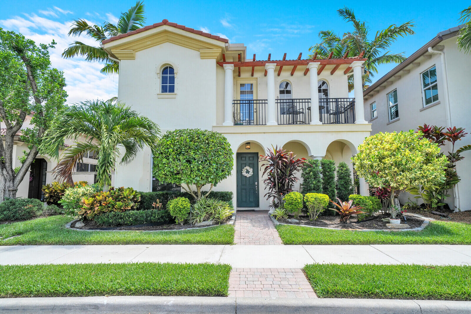 Welcome to 78 Stoney Dr, a beautifully updated 3-bedroom, 3.5 bath home in the sought-after resort-style community of Evergrene, Palm Beach Gardens. Step inside to find an airy, light-filled layout featuring soaring ceilings, a newly remodeled kitchen, and fresh flooring on the main level. The first floor boasts a private bedroom, perfect for guests or a home office, while upstairs you'll find the serene primary suite with a walk-in closet and spa-like en-suite, along with an additional guest bedroom and full bath. Outside, a secluded patio surrounded by lush greenery offers the perfect space to relax and unwind.  Living in Evergrene means enjoying unparalleled amenities, including a stunning lakefront clubhouse, a fitness center, a sparkling pool, and a full-service tiki bar.  Stay active with pickleball courts or soak in the beauty of the scenic lake with its pier and sandy beach. Conveniently located near top-rated schools, premier shopping and dining, and South Florida's breathtaking beaches, this home offers the perfect blend of comfort, convenience, and luxury.