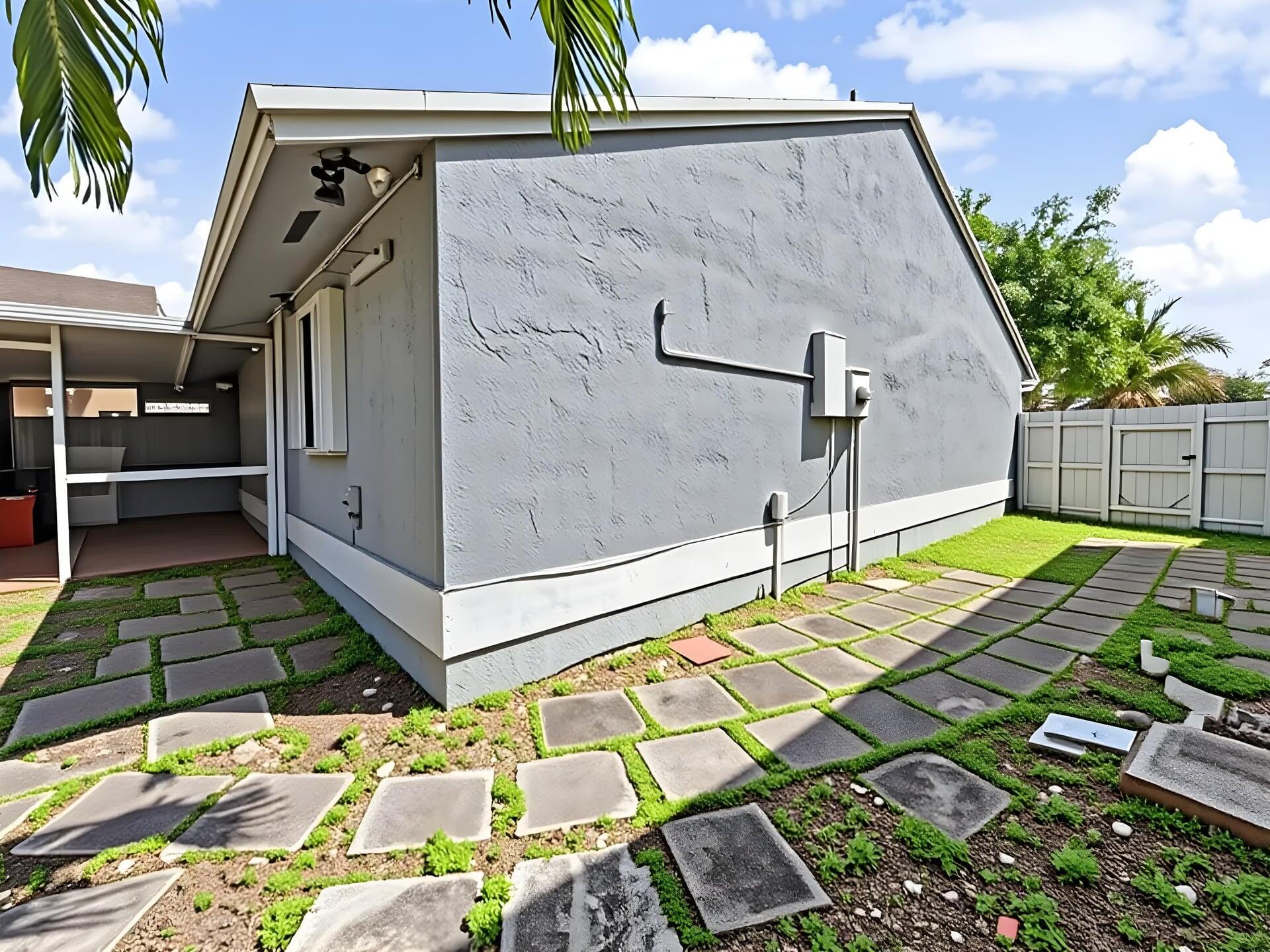 Beautifully maintained 2-bedroom, 2-bath cornervilla located in the highly desirable gated community of Coral Lakes in Pembroke Pines. This move-in ready home features a bright and open layout with vaulted ceilings, spacious living areas, and abundant natural light. The kitchen is equipped with wood cabinetry, granite countertops, and stainless steel appliances.  The primary suite offers a walk-in closet and private bath, while the second bedroom is generously sized with ample storage. Enjoy outdoor living in the large patio—perfect for relaxing or entertaining—with a private backyard and storage shed.  Additional features include accordion hurricane shutters, newer roof, tile flooring throughout, and in-unit washer/dryer. Low HOA and access to community pool just steps away. Conveni