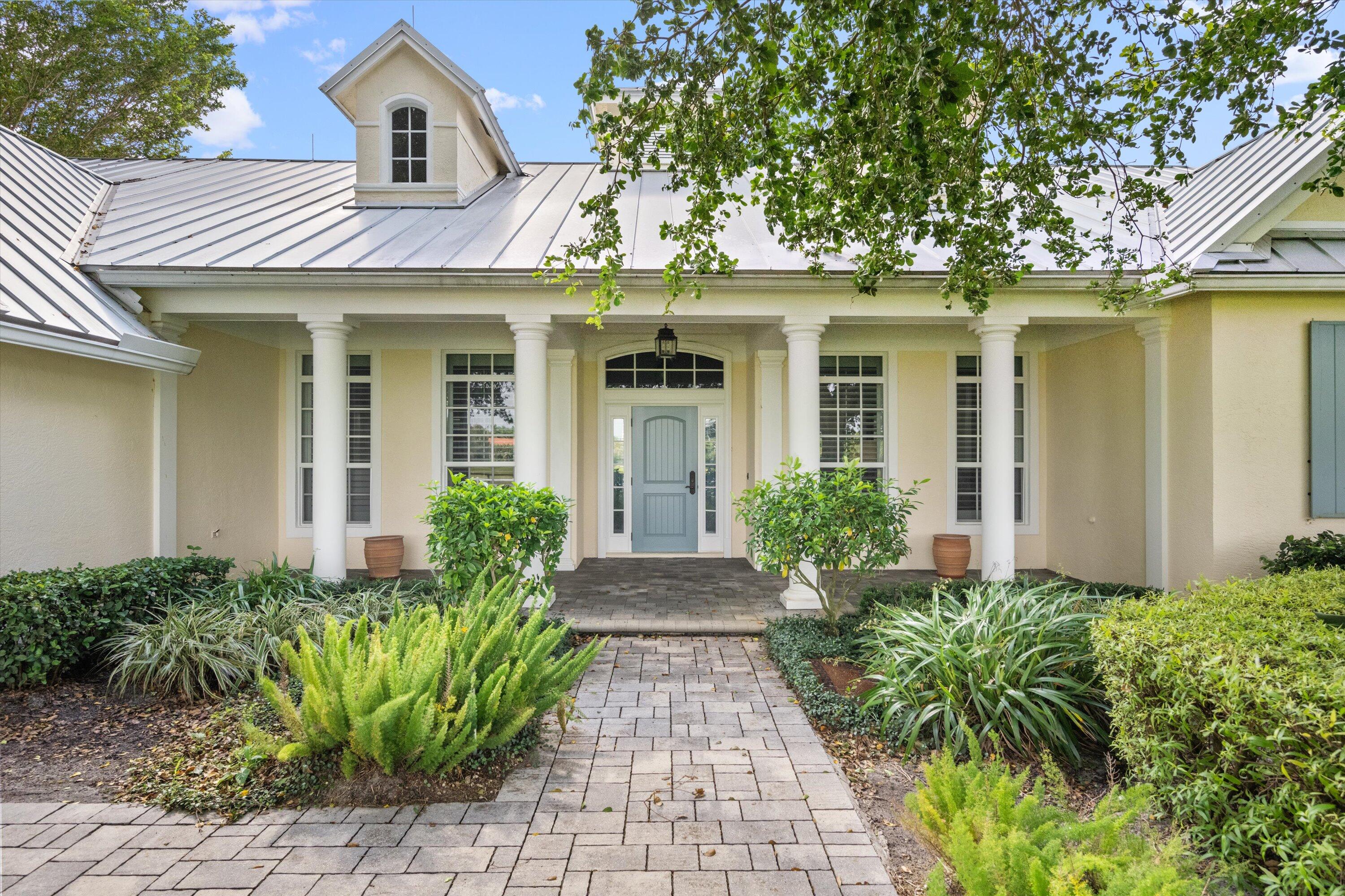 Well located in the elite gated community of Palm Beach Point. Charming 3/2 home with 2 car garage, screened patio, split bedroom plan, vaulted ceilings, SS appliances and ceramic tile throughout. Barn features 6 12x12 stalls, air-conditioned tack room, fly spray system, washer/dryer, large sand ring and 8 paddocks. RO water treatment system services both house and barn. Property sits on a lushly landscaped 5-acre lot with proximity to the Palm Beach International Equestrian Center. House and barn are fully impact glass, kept neat and clean and nicely updated. Adjacent 5 acre lot is also available for sale. A rare find!