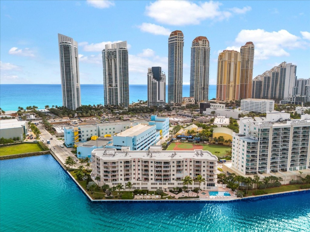 Rarely available 2 bedroom 2 bathroom unit with huge lanai-type patio with incredible intracoastal water and bay views.  Cable TV and Internet. Washer and dryer inside unit. Open Kitchen. Spacious walk-in closet. Tiles through-out. One assigned parking space in the covered garage. Walk to the Ocean, Local grocery stores. A-rated Sunny Isles school is across the street. Very quiet building! No pets allowed as per association. Very flexible rental policy - CAN BE RENTED FOR MINIMUM 2 WEEKS.