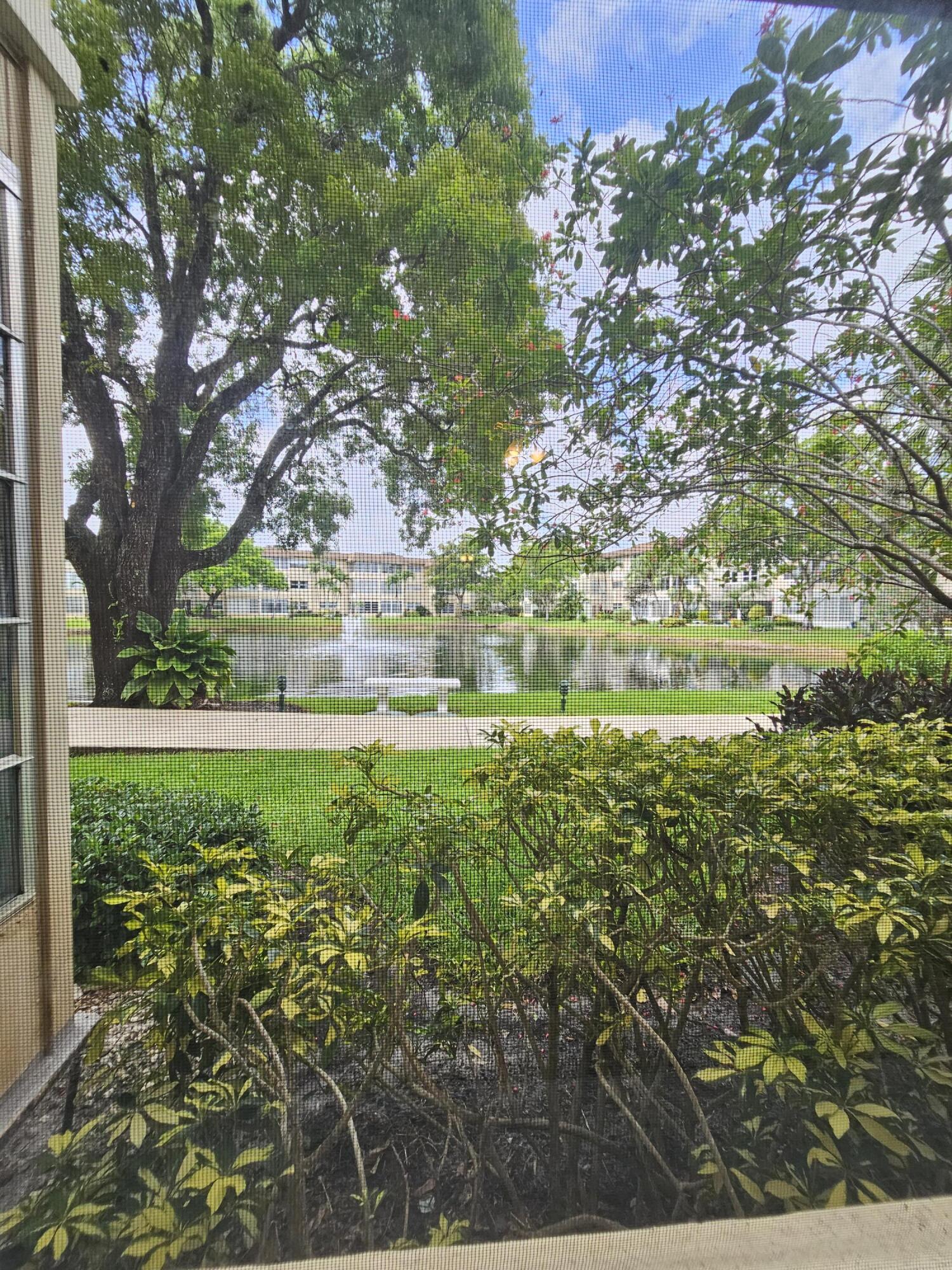 Fantastic first-floor condo in desirable 55+ Hawaiian Gardens in Lauderdale Lakes! This 1-bedroom, 1-bath residence offers serene South Florida living with a spectacular lake and fountain view from your enclosed glass patio, currently used as additional living space/den perfect for relaxing, reading or hosting guests. Bright and well-maintained unit with a newer water heater and spacious layout. Furniture negotiable for a possible move-in ready opportunity. Enjoy the active adult lifestyle with resort-style amenities including heated pool, clubhouse, fitness room, walking paths, shuffleboard, pickleball, billiards, library, BBQ areas, social events, bingo, dances and more. Conveniently located near shopping, dining, medical facilities, beaches and major highways. Peaceful waterfront living Building has a new roof