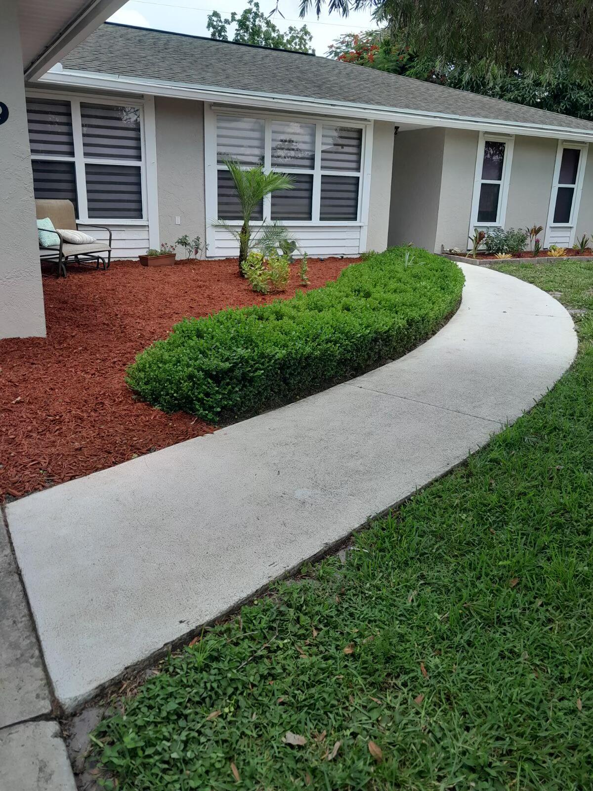 Welcome to this charming single-story residence located in Port St. Lucie, offering 1,880 sq. ft. of well-appointed living space. This 3/2/2 home provides comfortable living with updated finishes, an efficient single-floor layout maximizes usability & flow throughout. The formal living room feature a shiplapped wall, dining area, family room, enjoy updated HIGHER END stainless steel appliances in the kitchen which is complimented w/glass subway tiles, quartz countertops & newer cabinetry. Primary suite offers a barn door adorn with shiplapped accents in primary bathroom. The oversized screened in back porch provides peace and serenity with its completely private newly fenced yard (2024) that sits on a DOUBLE LOT surrounded by mango, oak, & tropical foliage.NO HOA/NO FEES-NEWER A/C-2023